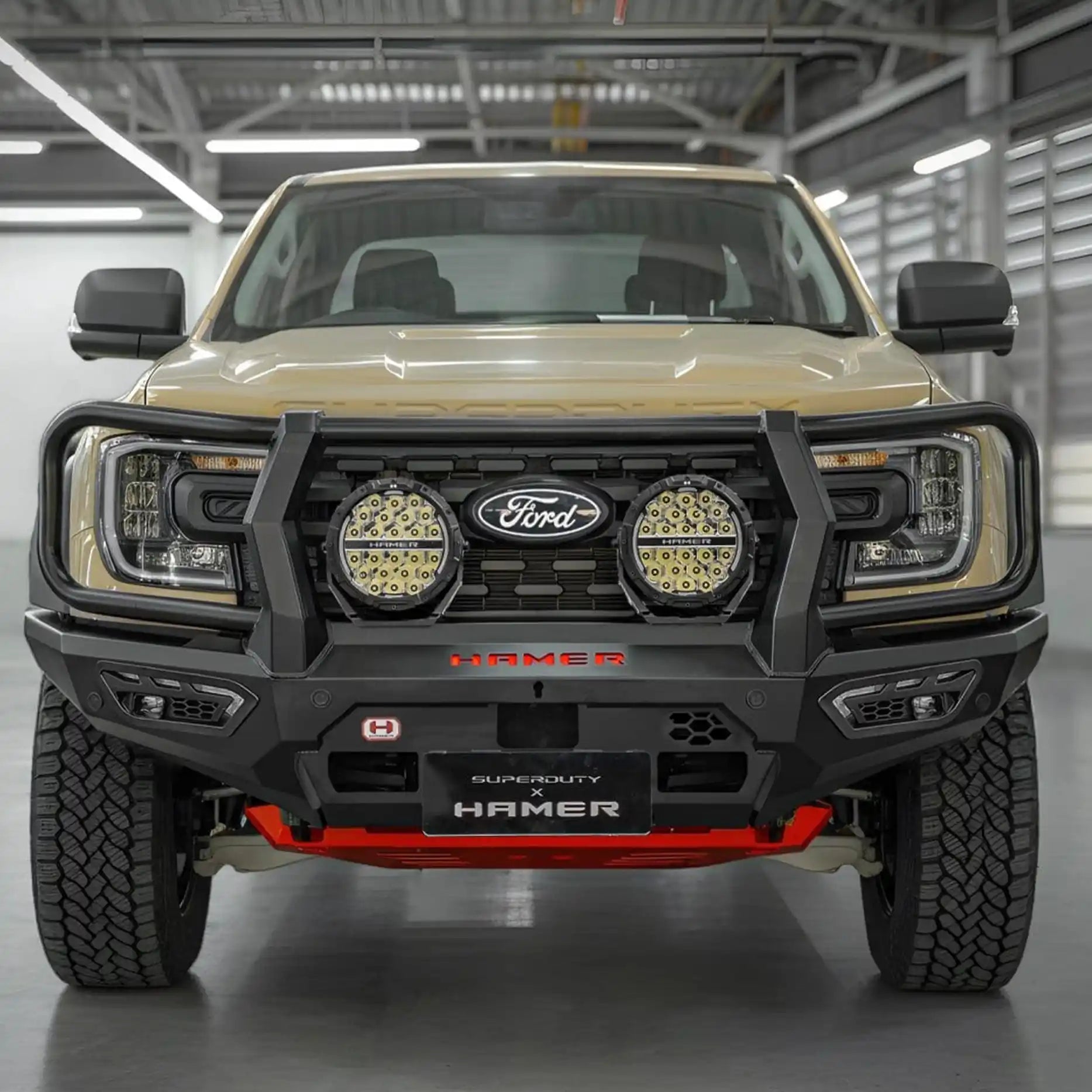Front view of the Atlas Series Plus Bull Bar installed on a Ford Ranger Super Duty 2025+, highlighting its full bumper replacement design, integrated LED lighting, and sleek matte black finish. Engineered for strength and safety, this premium bull bar is supplied and fitted by Elevated 4x4 for serious touring and off-road builds across Newcastle and the Hunter Valley.