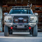 Front installed view of Atlas Series Plus Bull Bar in white on Ford Ranger (2022–Present) by Elevated 4x4 Australia, showing ADR compliance and LED lights.