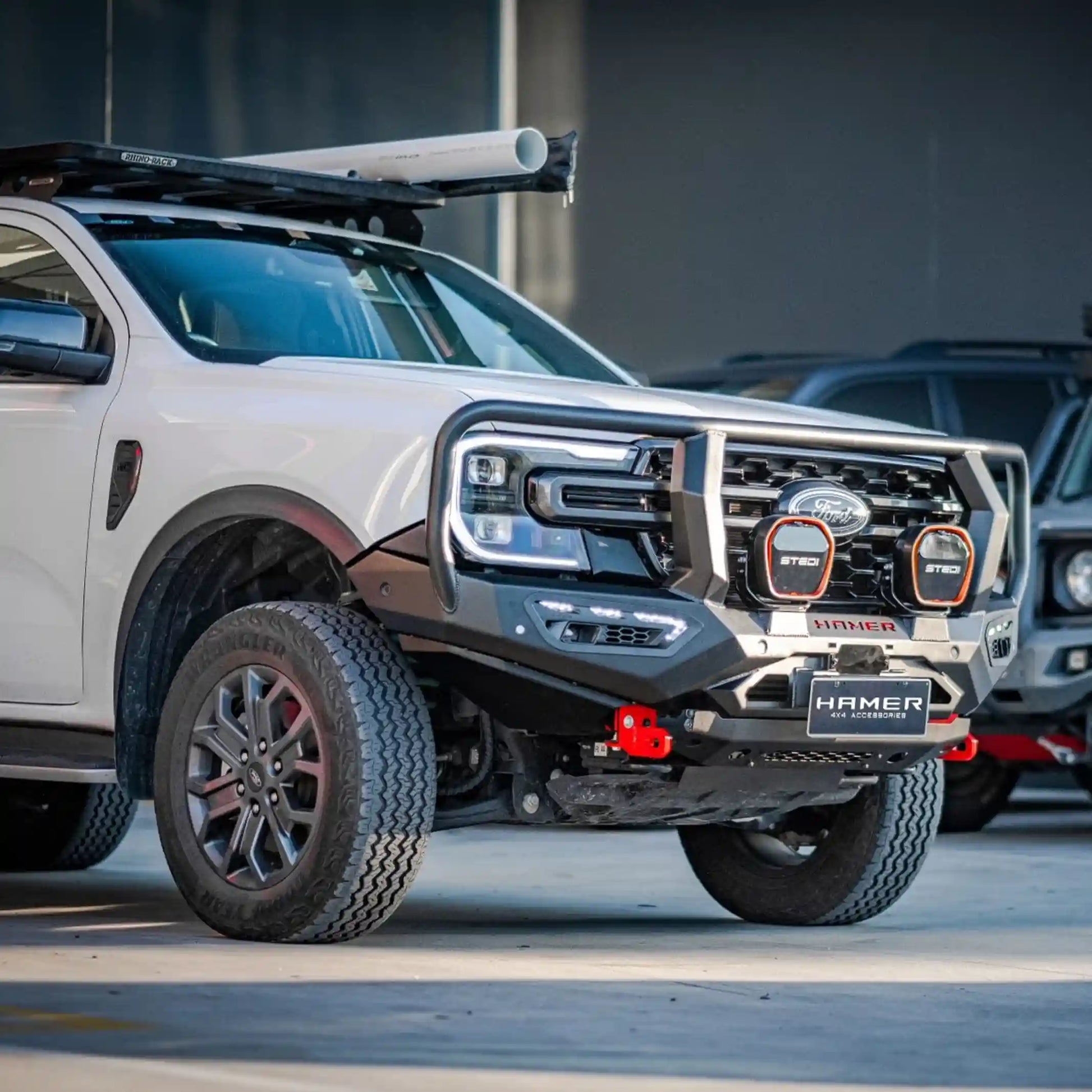 Left installed view of Atlas Series Plus Bull Bar on Ford Ranger (2022–Present) by Elevated 4x4 Australia, highlighting rated recovery points, ADR compliance, and off-road-ready design.