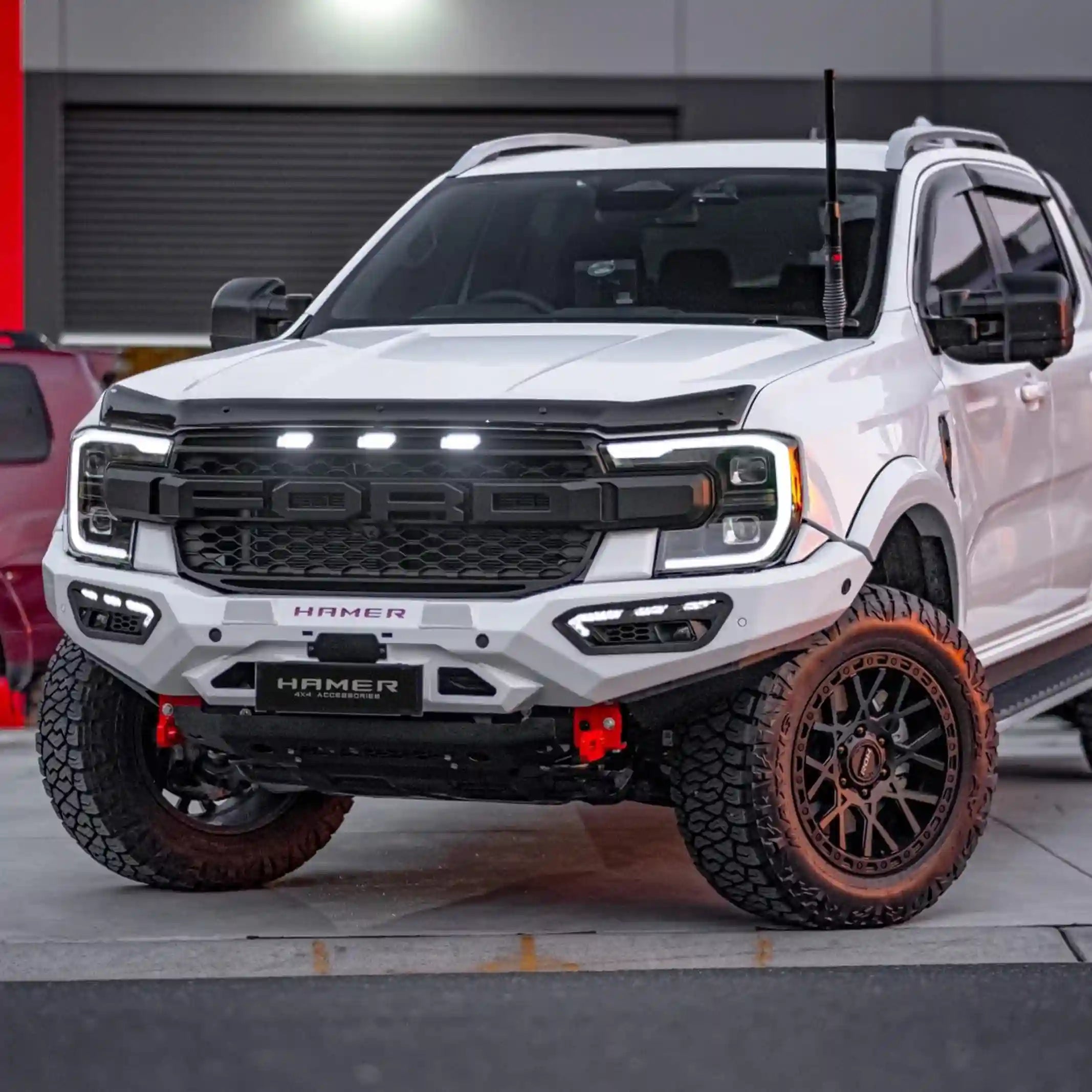 Right installed view of Atlas Series Bull Bar on Ford Ranger (2022–Present) by Elevated 4x4 Australia, showing full bumper replacement, LED lights, and off-road-ready ADR compliance.