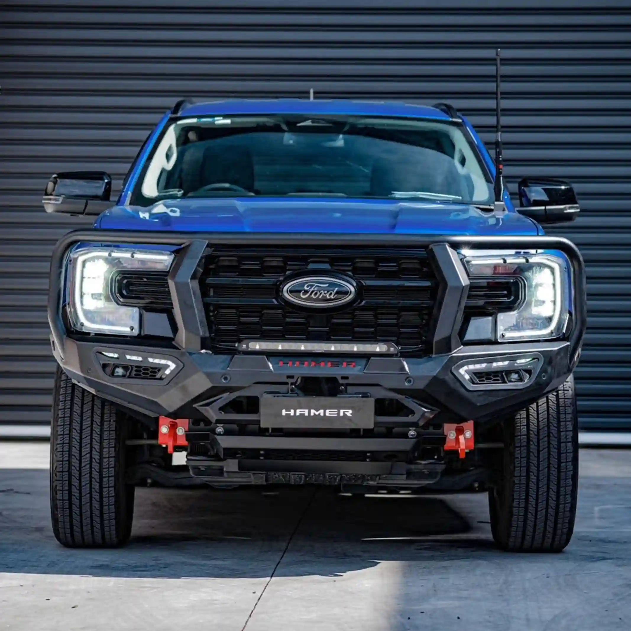 atlas series plus bull bar for ford everest 2022 blue vehicle front display highlighting integrated radar sensor compatibility matte black powder coat and stylish led lighting elevated 4x4