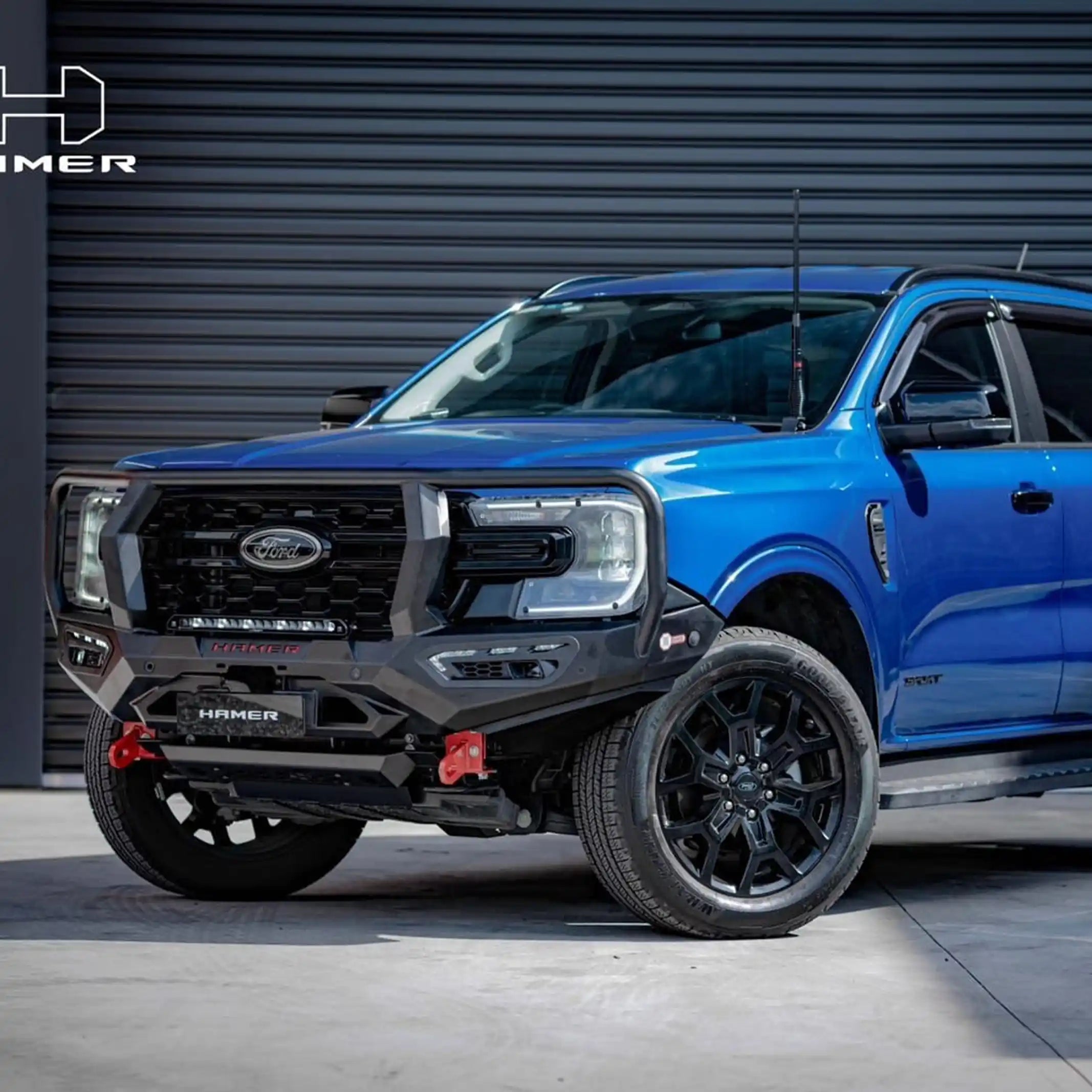 atlas series plus bull bar for ford everest 2022 blue vehicle right side angle featuring adr compliant construction high grade steel and winch mount access elevated 4x4