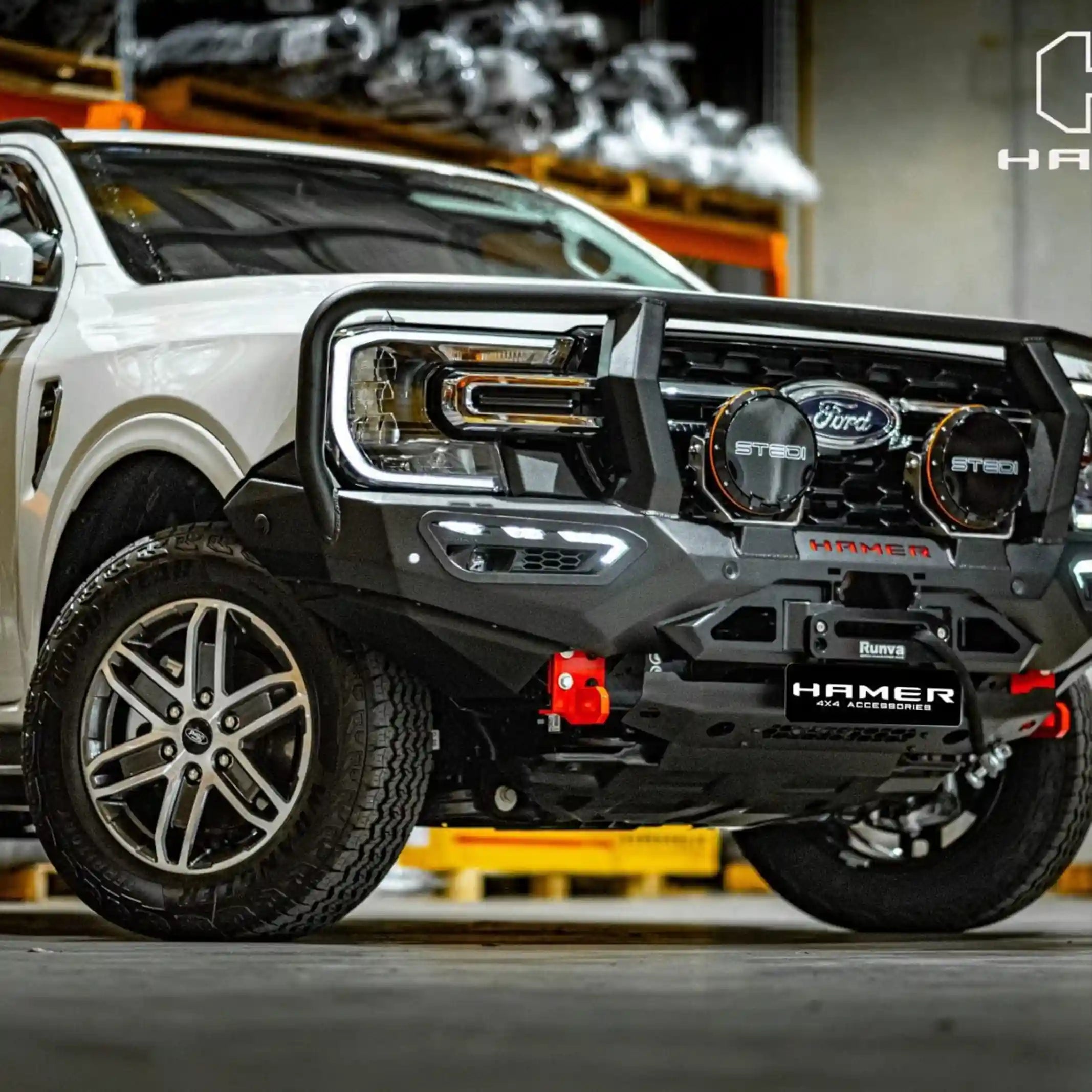 atlas series plus bull bar for ford everest 2022 white vehicle left angle showing airbag compliance radar module compatibility durable powder coated finish and extra light mounts elevated 4x4