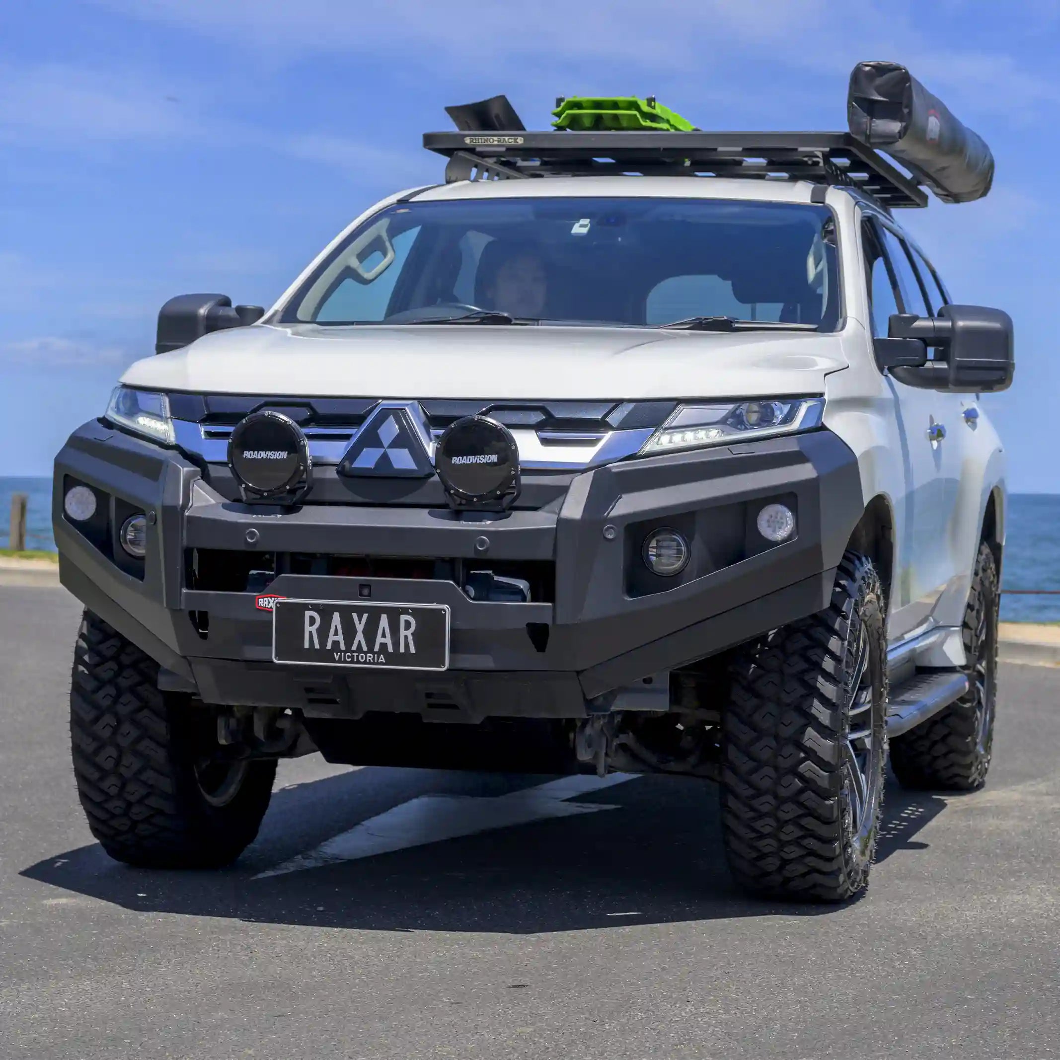 Front installed view of the RAXAR no loop bull bar fitted to Mitsubishi Pajero Sport QF, highlighting its ADR compliance, durable matte black finish, and full winch compatibility. A tough and stylish 4WD upgrade available nationwide at Elevated 4x4.
