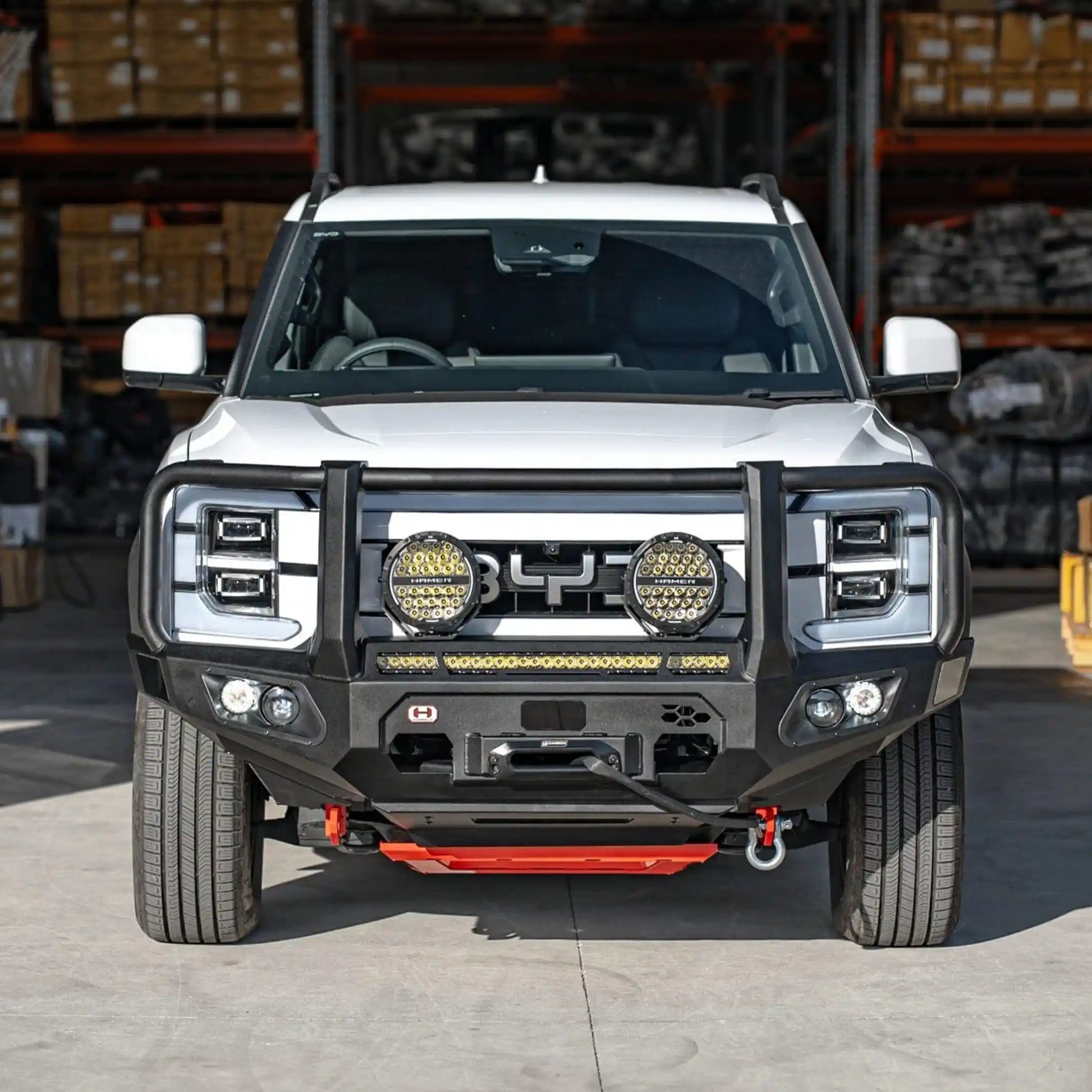 front installed view of hamer king series plus bull bar on byd shark 6 2024 showing 22 inch light bar slot matte black steel finish adr compliant design elevated 4x4