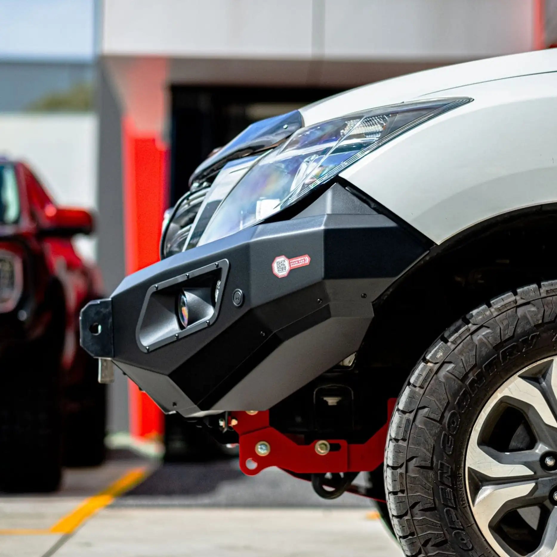 Close-up right angle of Mazda BT-50 2012–2020 fitted with Hamer King Series Bull Bar, highlighting recovery points, winch compatibility, and 3mm high-grade steel construction.