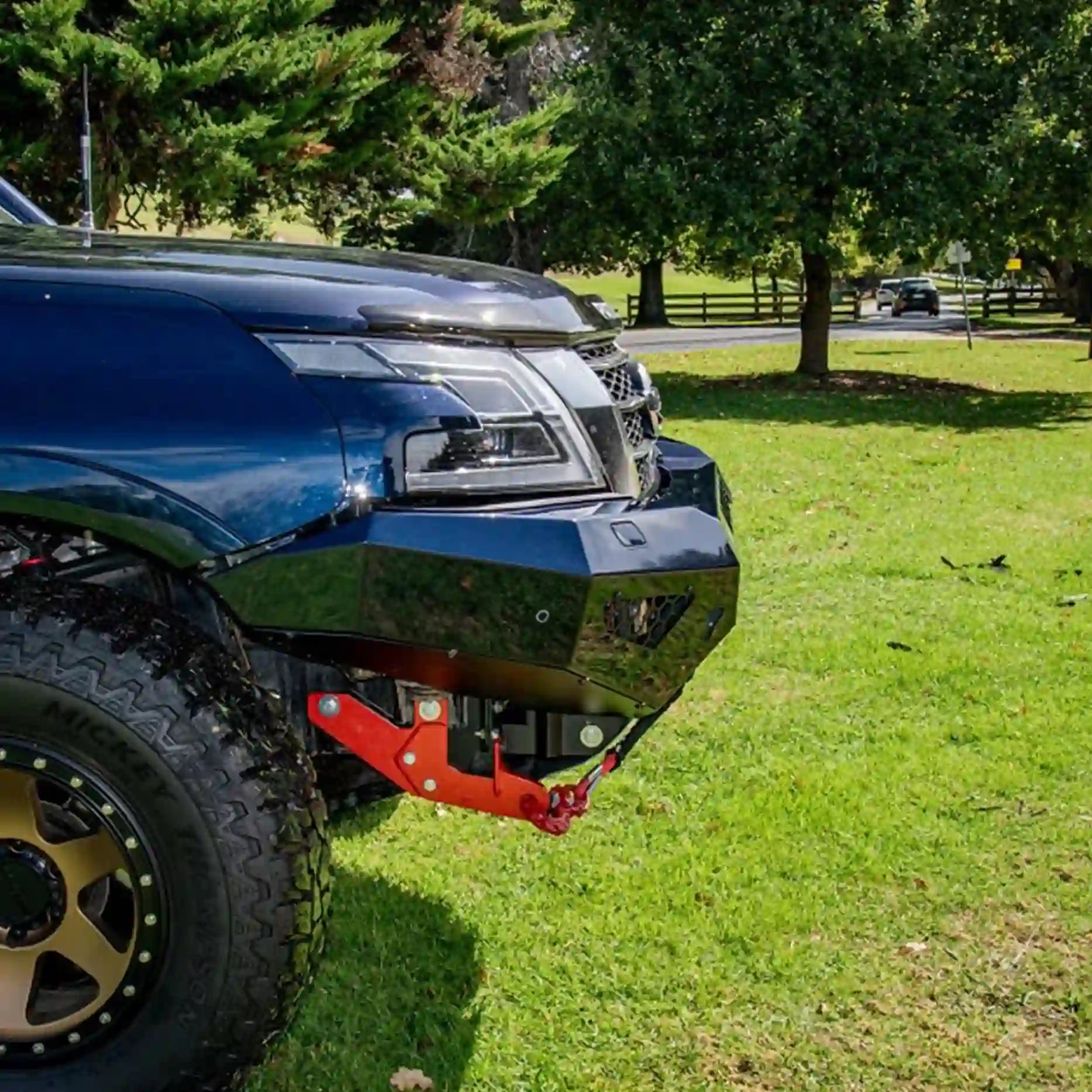 Close-right shot of the Offroad Animal Cobra Bull Bar on a Nissan Patrol Y62, capturing its precision steelwork, mesh infills, and integrated recovery points. Elevated 4x4’s expert fitment ensures unbeatable strength and sleek style for every off-road challenge.