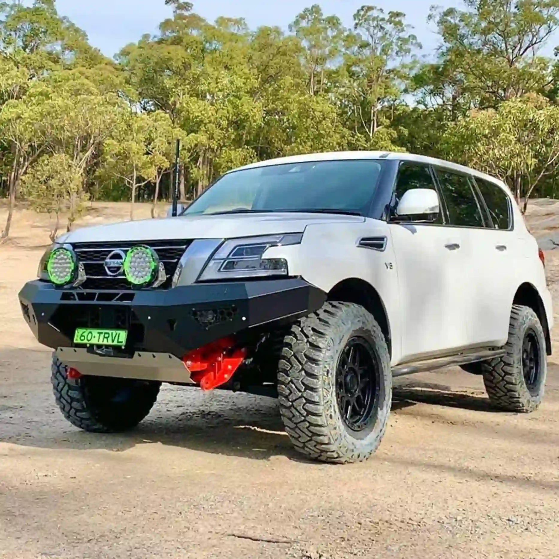 Left-side angle of the Offroad Animal Cobra Bull Bar on a Nissan Patrol Y62 2020-on model, highlighting its contoured fit and integration with factory sensors. Elevated 4x4 delivers smart, compliant solutions that blend protection, performance, and modern aesthetics for adventurous drivers.