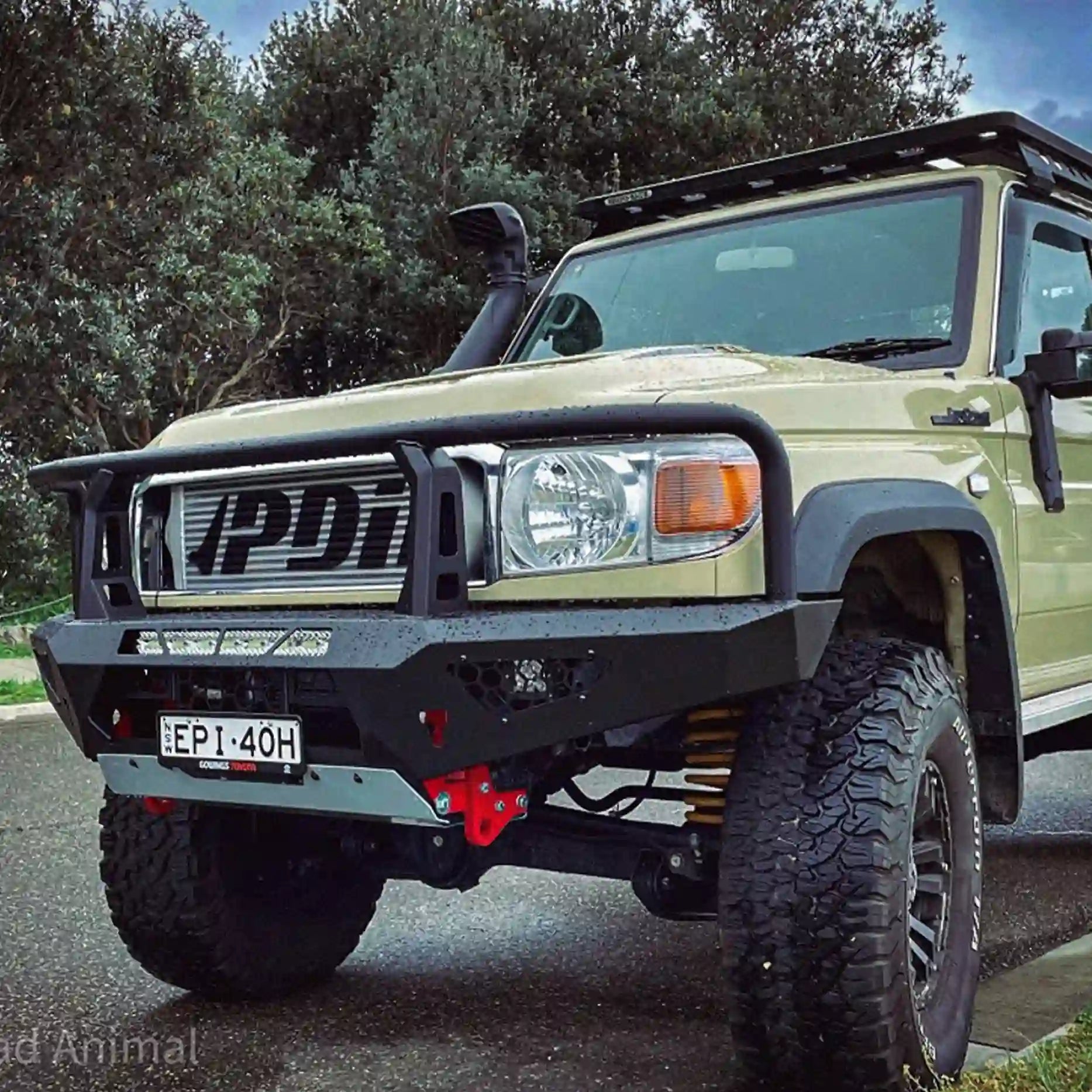 Left side angle of the Offroad Animal Toro Bull Bar on a Toyota Land Cruiser 76 Series, highlighting its precision fitment, light mounting options, and aggressive stance. Expertly fitted by Elevated 4x4, it delivers premium protection and standout looks for touring across Nelson Bay and Port Stephens.