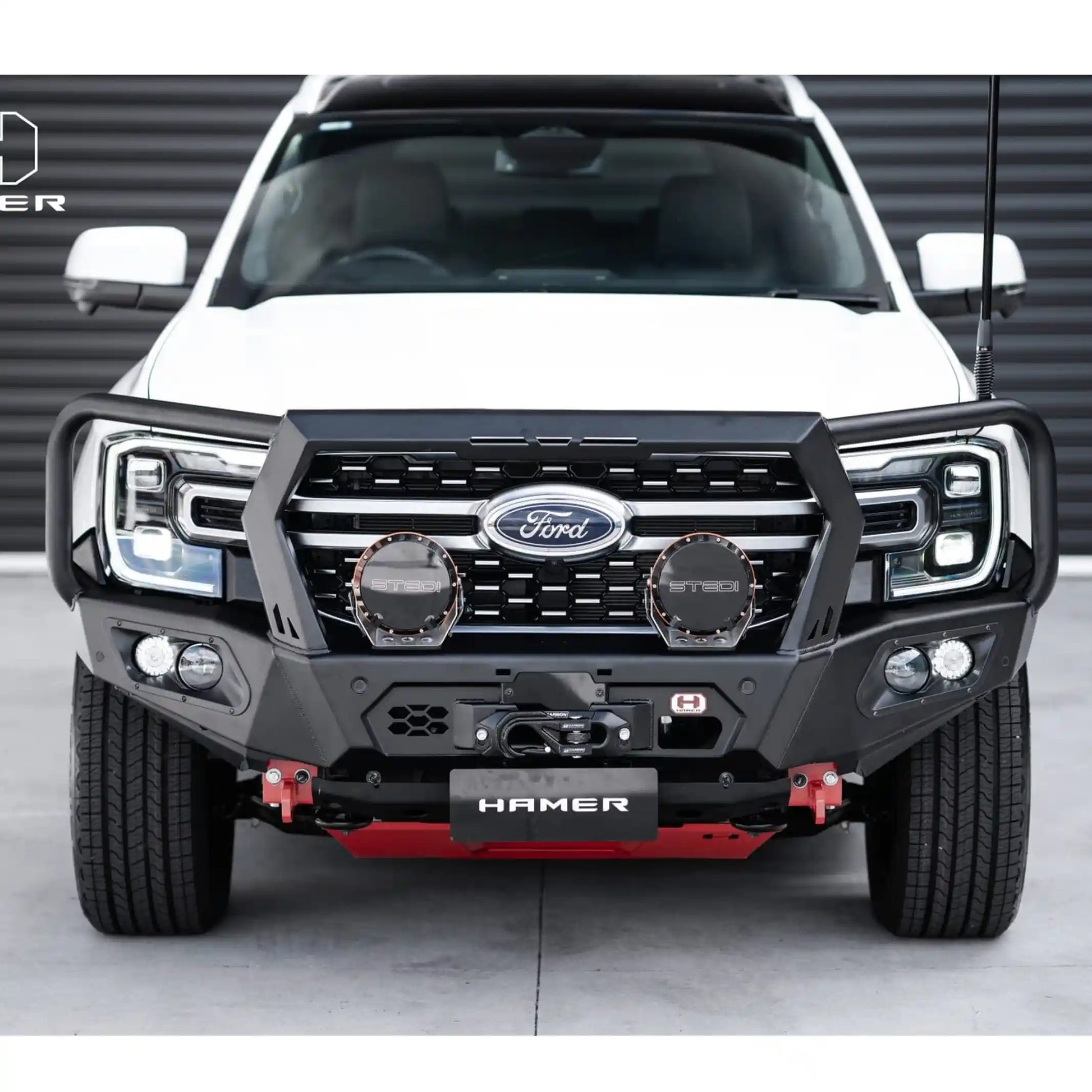 straight front view of ford everest 2022 fitted with hamer king series plus bull bar showing adr compliance matte black finish and led lighting elevated 4x4