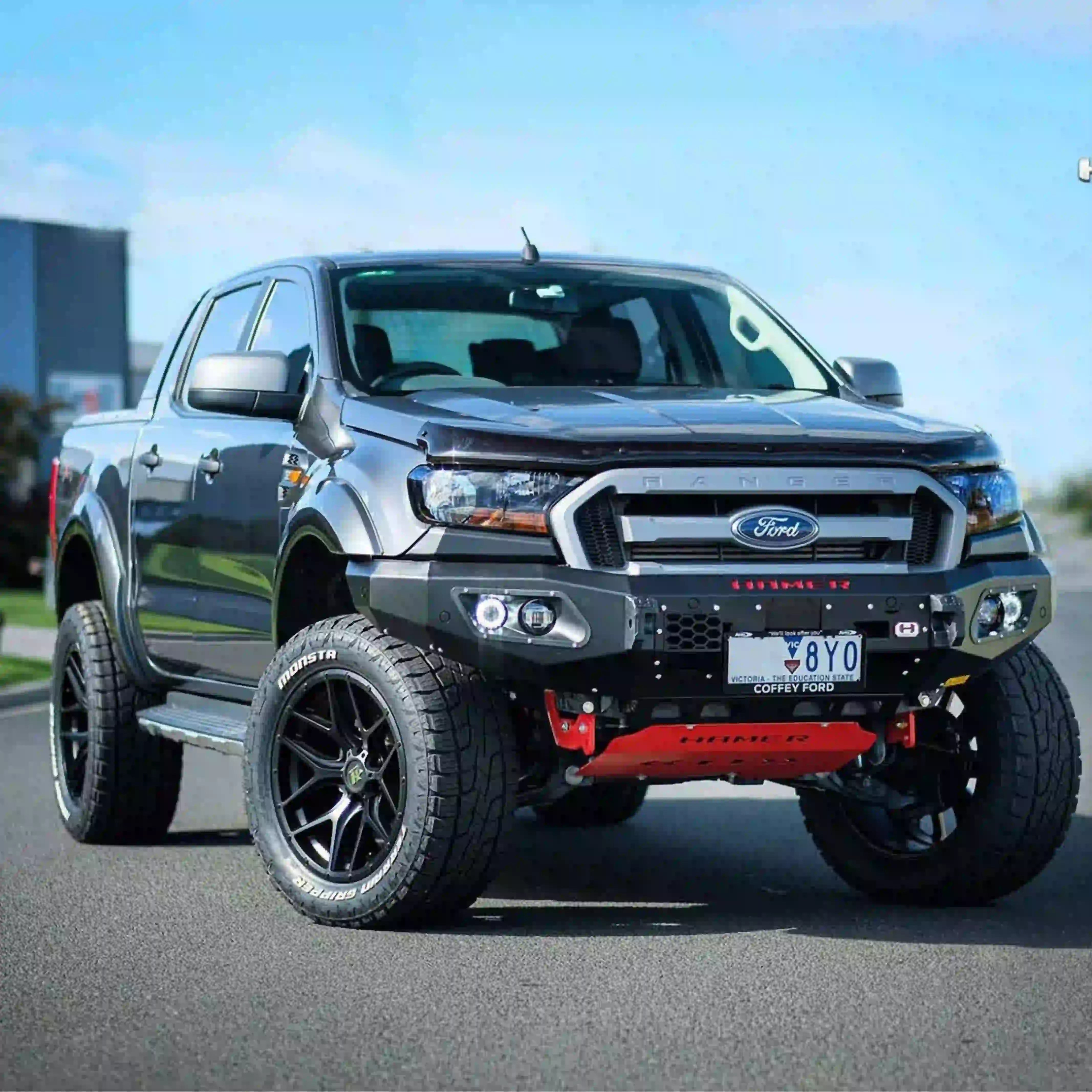 Left side view of Hamer King Series Bull Bar on Ford Ranger PX2 / PX3, with European E-Mark certified LED DRLs, fog lamps, and seamless factory integration.