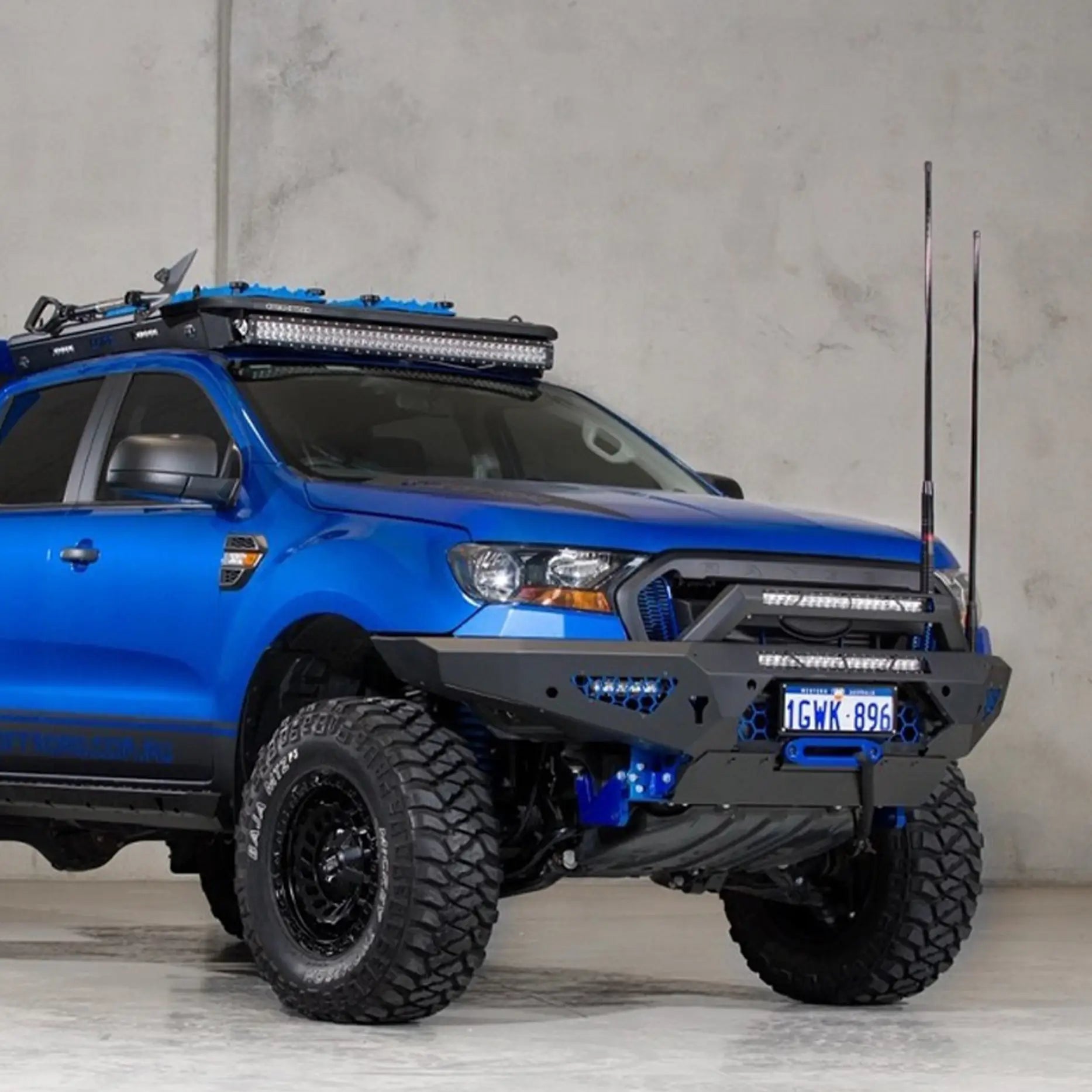 Left-side profile view of the Offroad Animal Predator Bull Bar fitted to a Ford Ranger PX3, emphasizing its precision-engineered fit, airflow slots, and welded steel toughness. Available through Elevated 4x4, this 4WD upgrade enhances strength, recovery readiness, and visual appeal for Australian off-road and adventure enthusiasts.