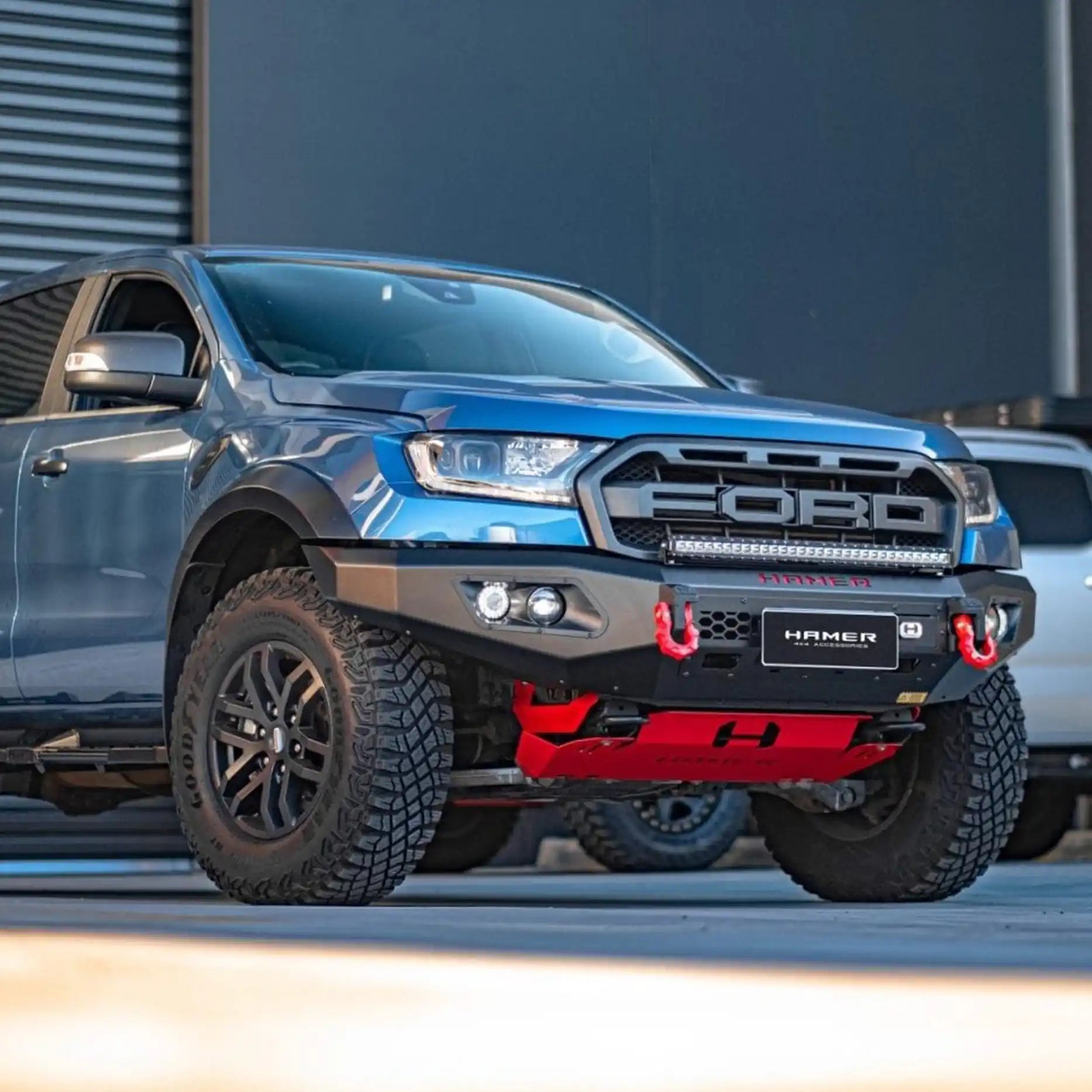 Left side angle of Ford Ranger Raptor 2018–2022 with Hamer King Series Bull Bar, showing 3mm high-grade steel construction, bumper replacement style, and recovery-ready build.