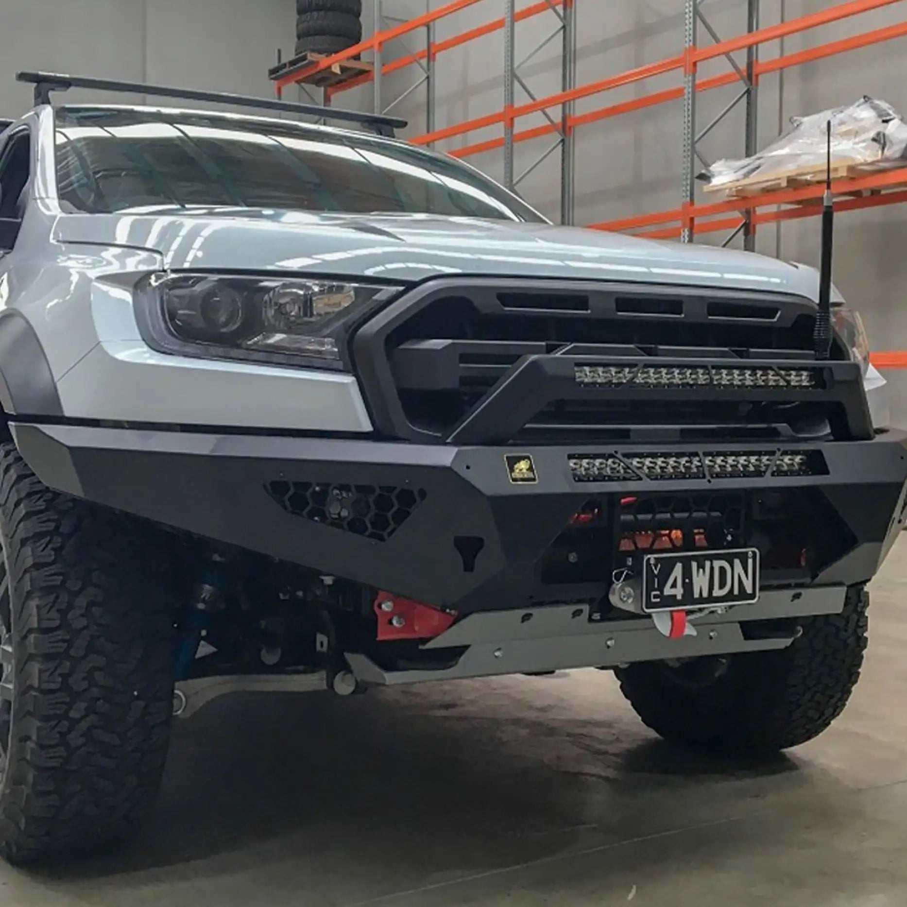 Left-side profile of the Offroad Animal Predator Bull Bar installed on a Ford Ranger Raptor, emphasizing its clean integration and airflow-focused engineering. Designed for strength and style, this Elevated 4x4 upgrade enhances approach angles, recovery readiness, and aggressive 4WD aesthetics for serious off-road enthusiasts.