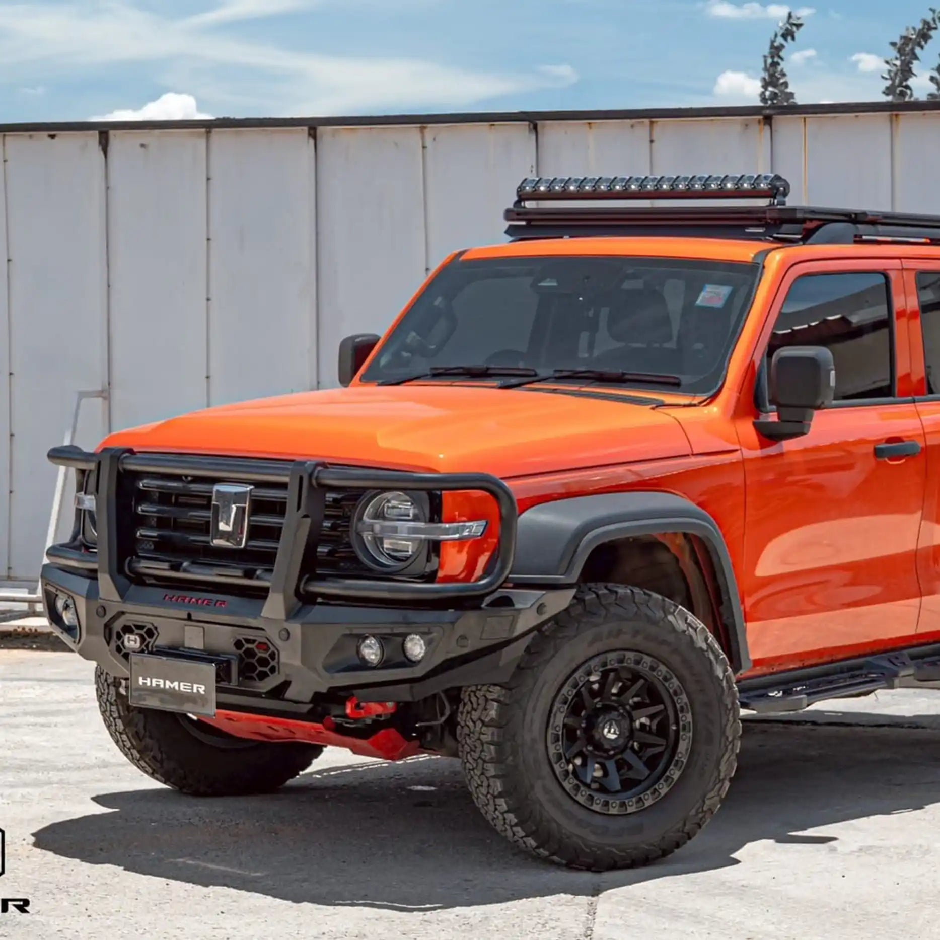 Right side profile of the GWM Tank 300 featuring the Hamer King Series Plus Bull Bar, complete with radar compatibility, winch lever access, and mounting points for extra lights and aerial.