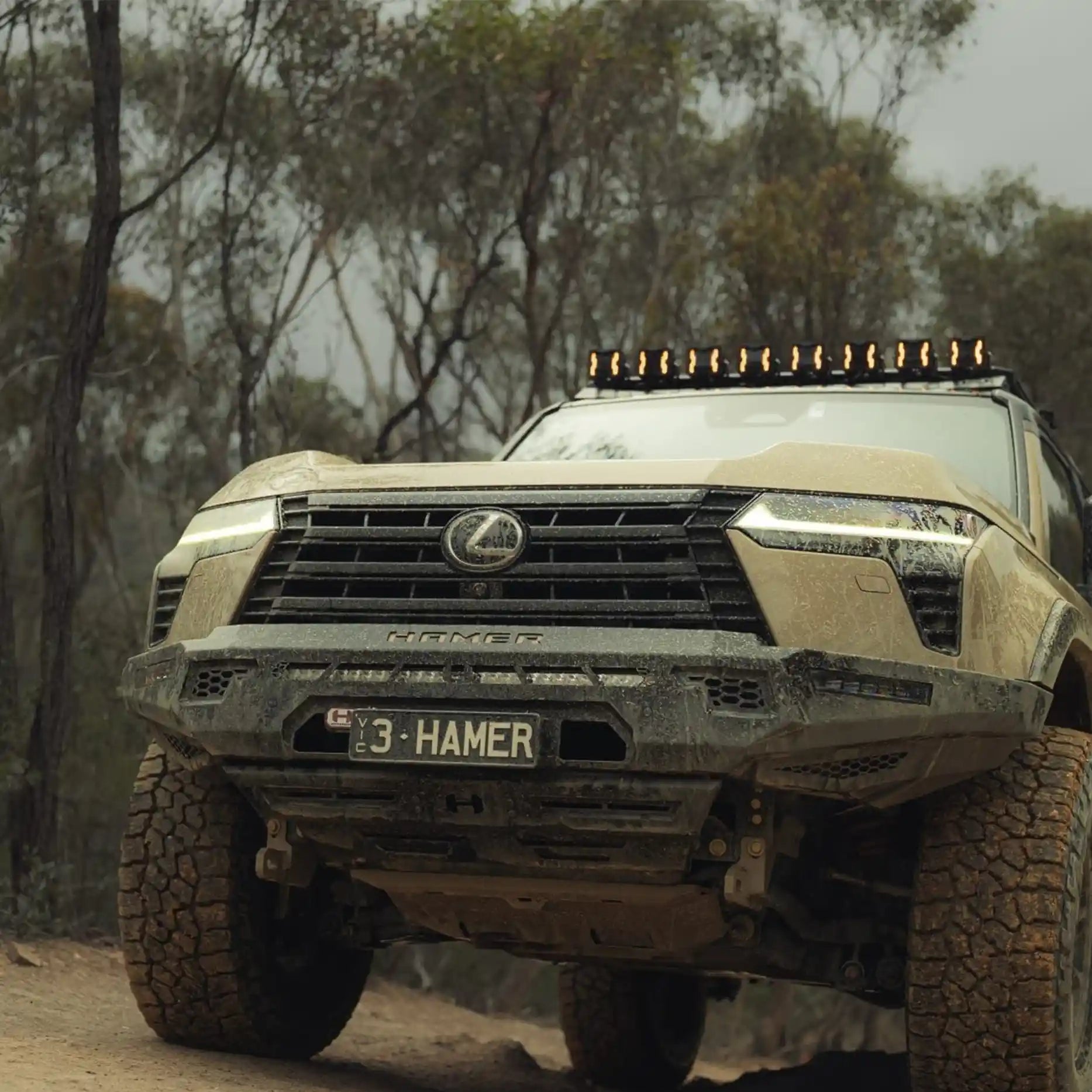 Right side angle of Hamer 4x4 Sierra Series Bull Bar on Lexus GX550, showing rugged matte black finish, winch compatibility, and sleek integrated design.