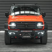 Angled front perspective of GWM Tank 300 with Hamer Atlas Bull Bar, showcasing integrated LED lighting, winch compatibility, and radar module support.
