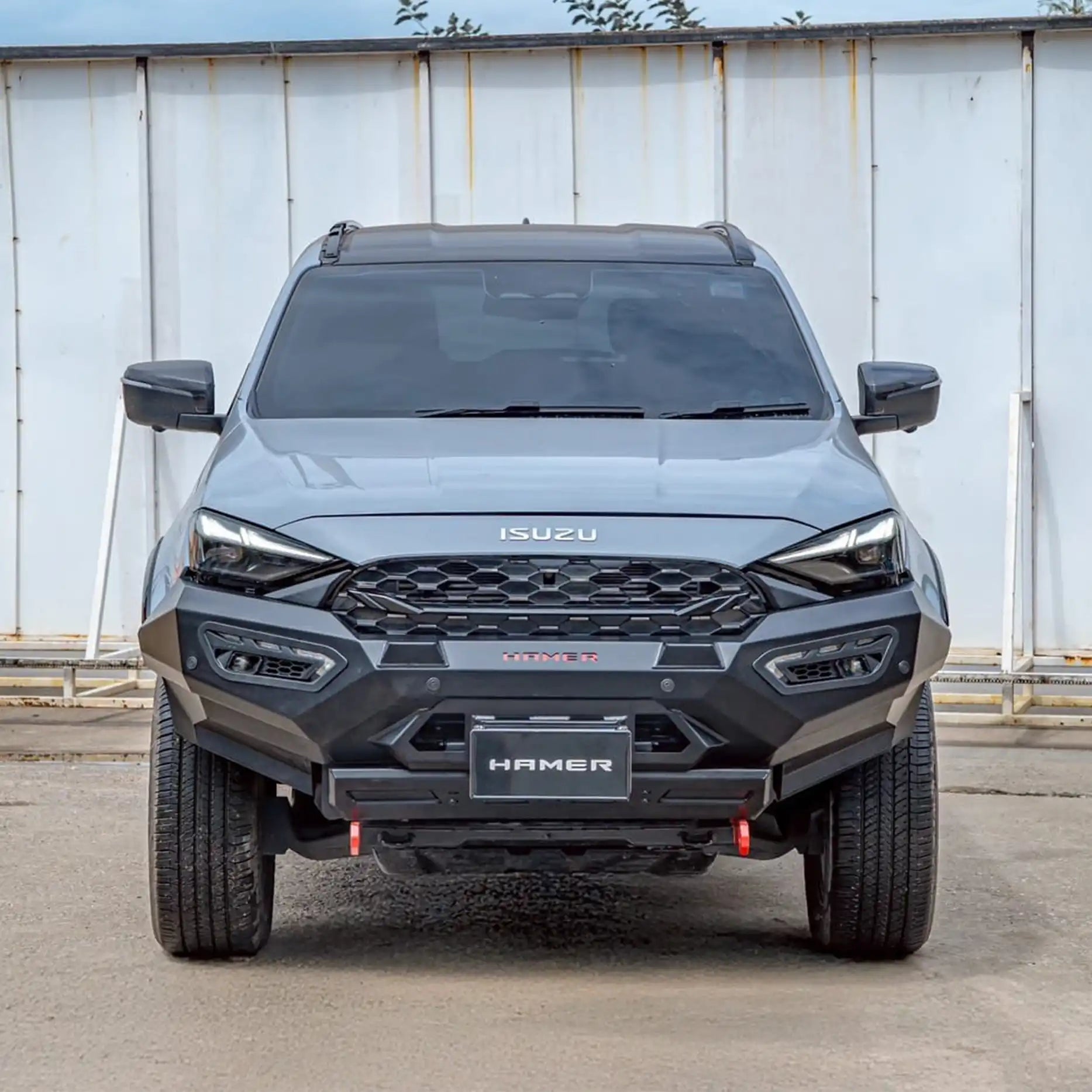 Front view of Isuzu MU-X 2025 with Hamer Atlas Series Bull Bar in matte black, highlighting ADR compliance, integrated LED lights, and rugged off-road styling.