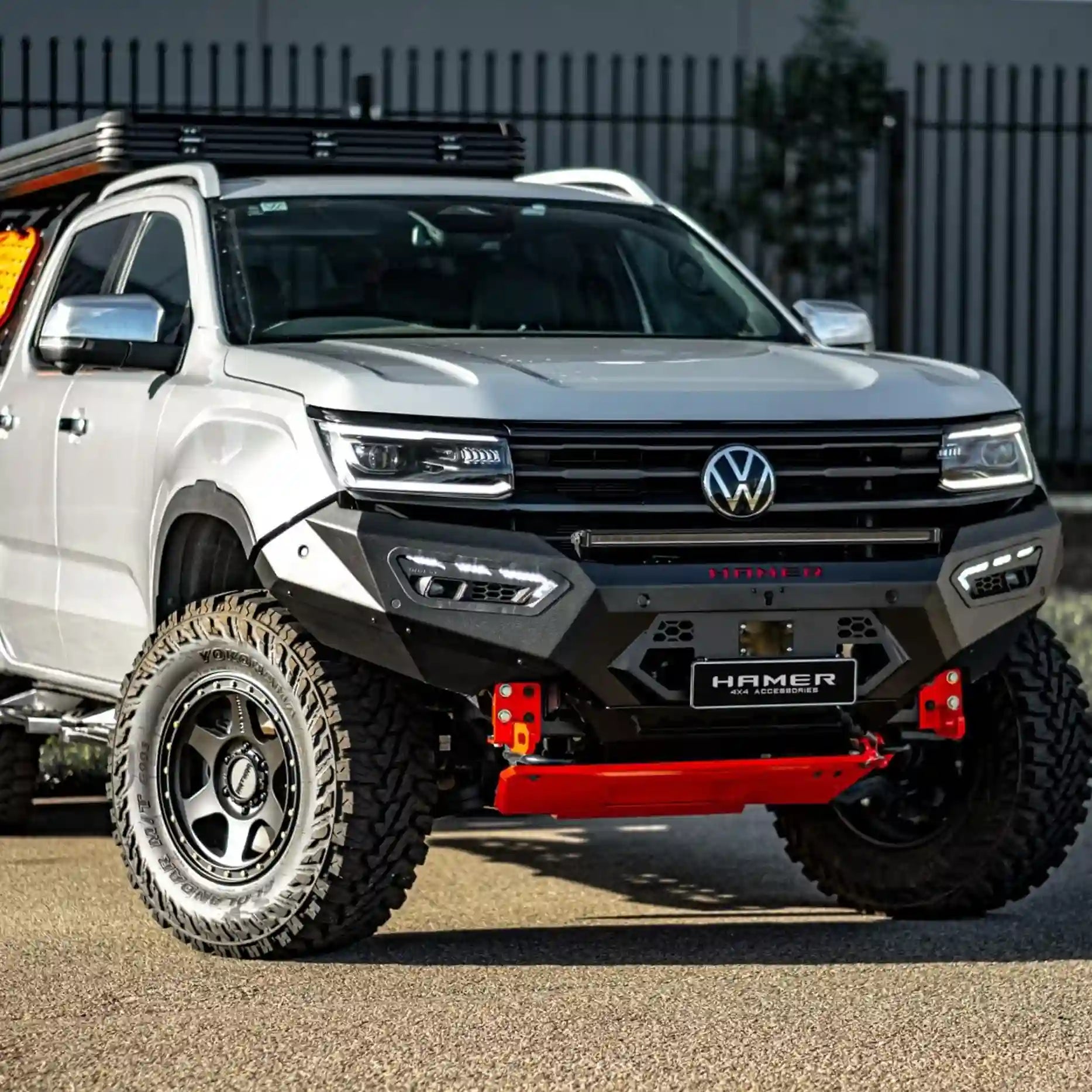 Left-side view of Volkswagen Amarok fitted with Hamer Atlas Series Bull Bar, showing radar module compatibility, parking sensor integration, and rugged design.