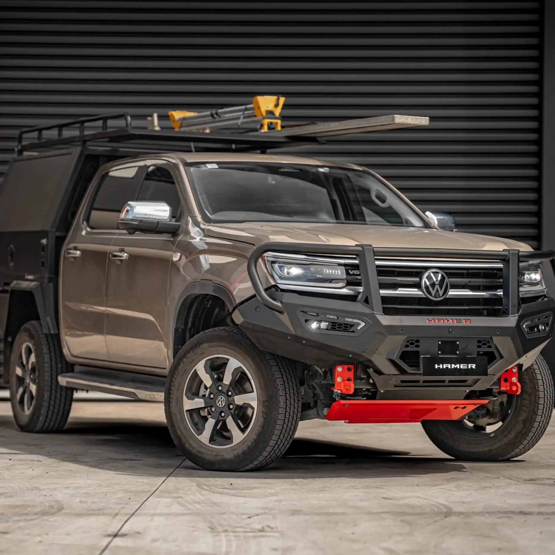Close-up left angle of Hamer Atlas Series Plus Bull Bar on Volkswagen Amarok (2023 – Present), highlighting robust 3 mm high-grade steel construction and sleek matte black finish.