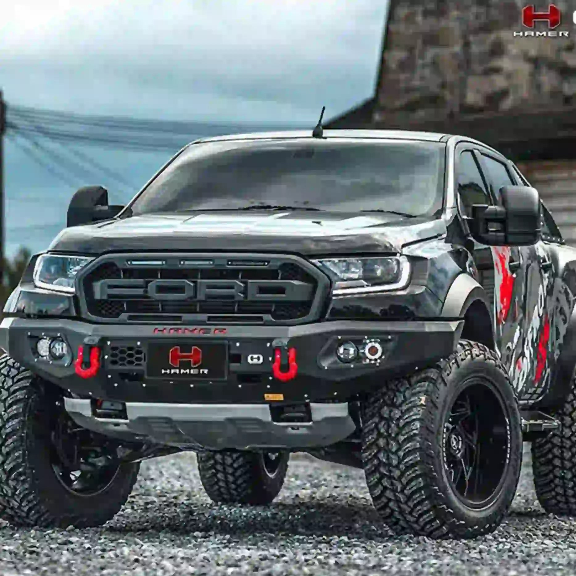 Right angle of Ford Ranger Raptor 2018–2022 equipped with Hamer King Series Bull Bar, highlighting winch compatibility, recovery points, and E-Mark certified LED lighting system.