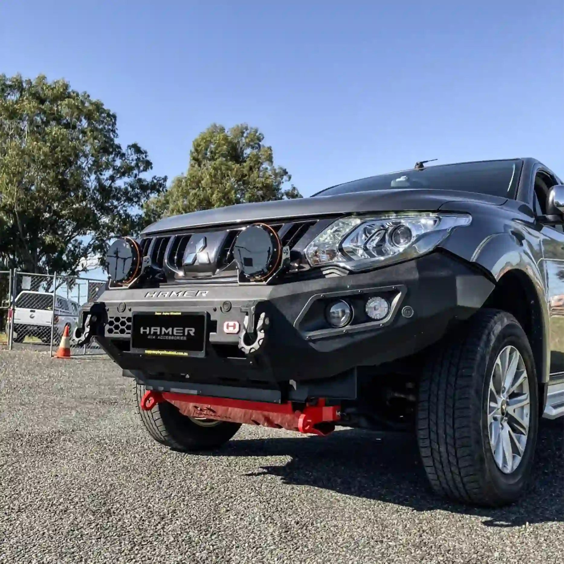 Right-hand view of Hamer King Series Bull Bar for Mitsubishi Triton MQ (2015–2018), highlighting E-Mark certified LED fog lamps.