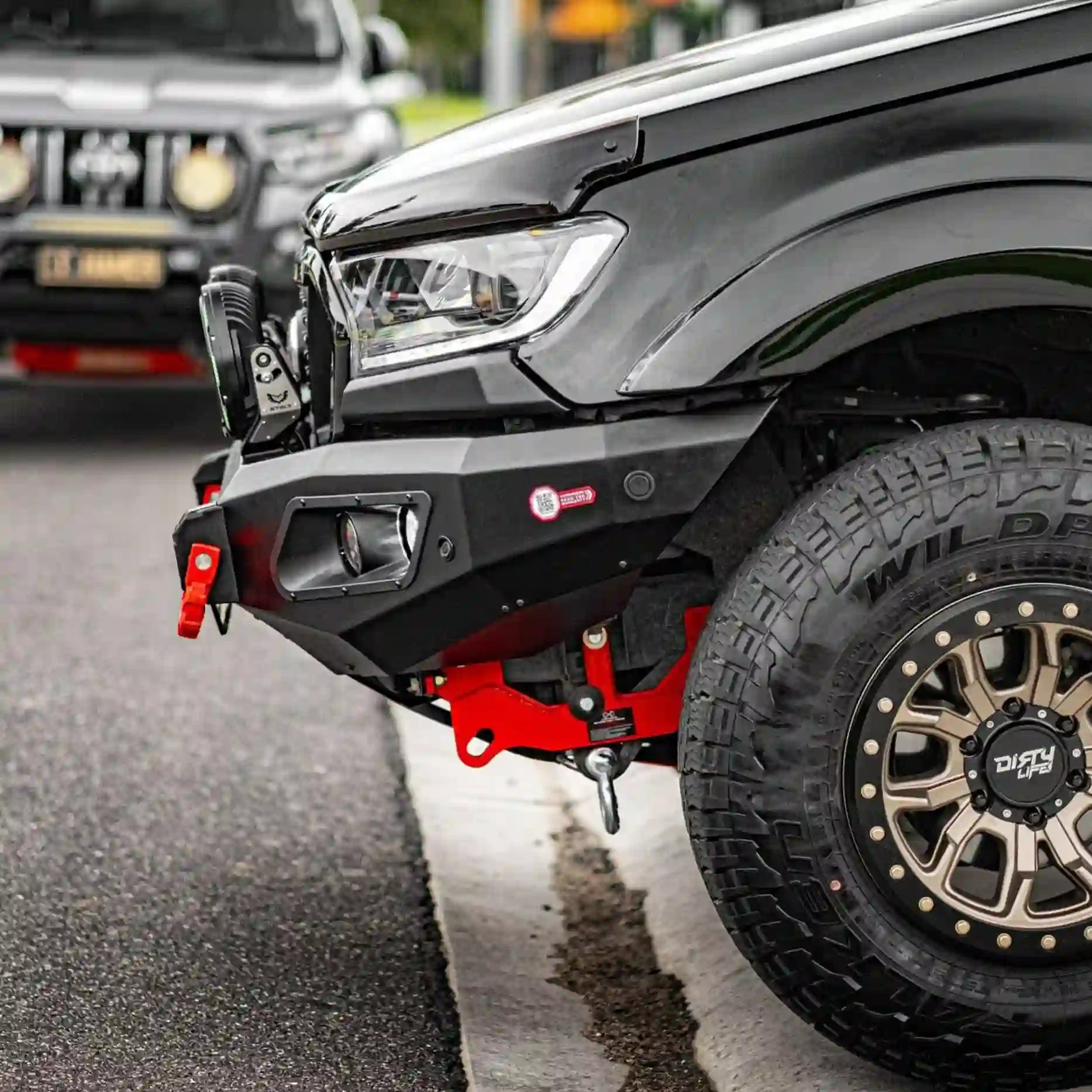 Side profile from the right of Hamer King Series Bull Bar for Ford Ranger PX2 & PX3, emphasizing parking sensor compatibility and robust splash guard system.