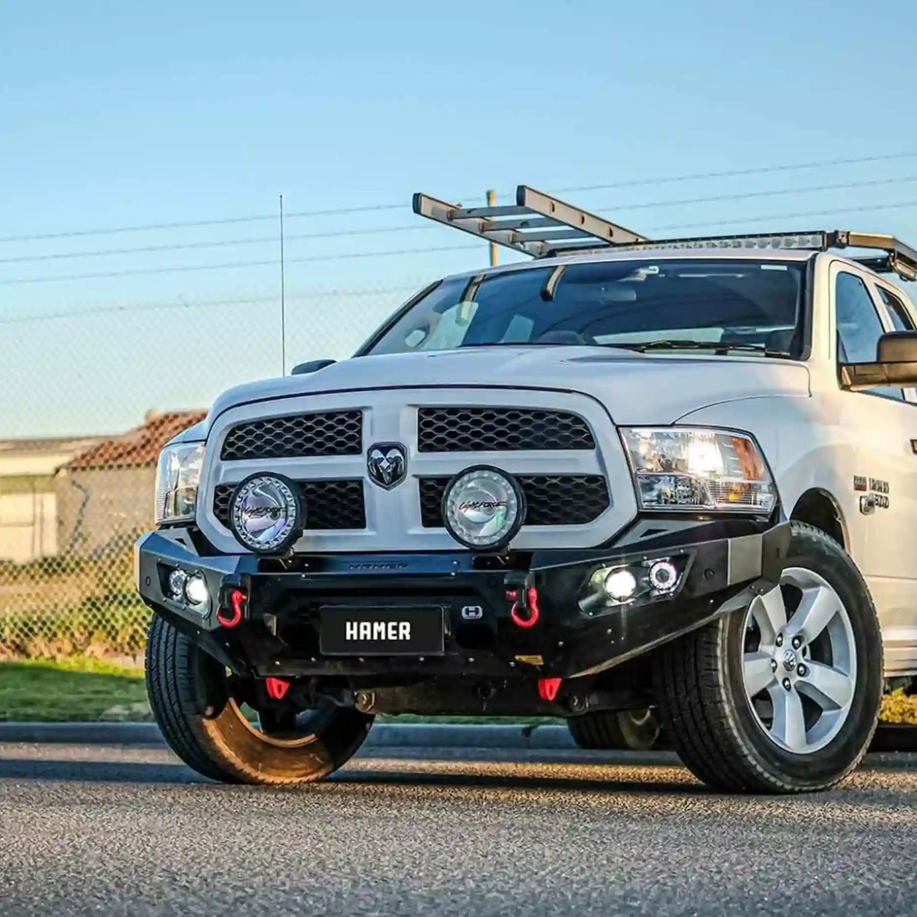Right side angle of Ram 1500 DS with Hamer King Series Bull Bar, parking sensor ready and E-Mark certified LEDs.