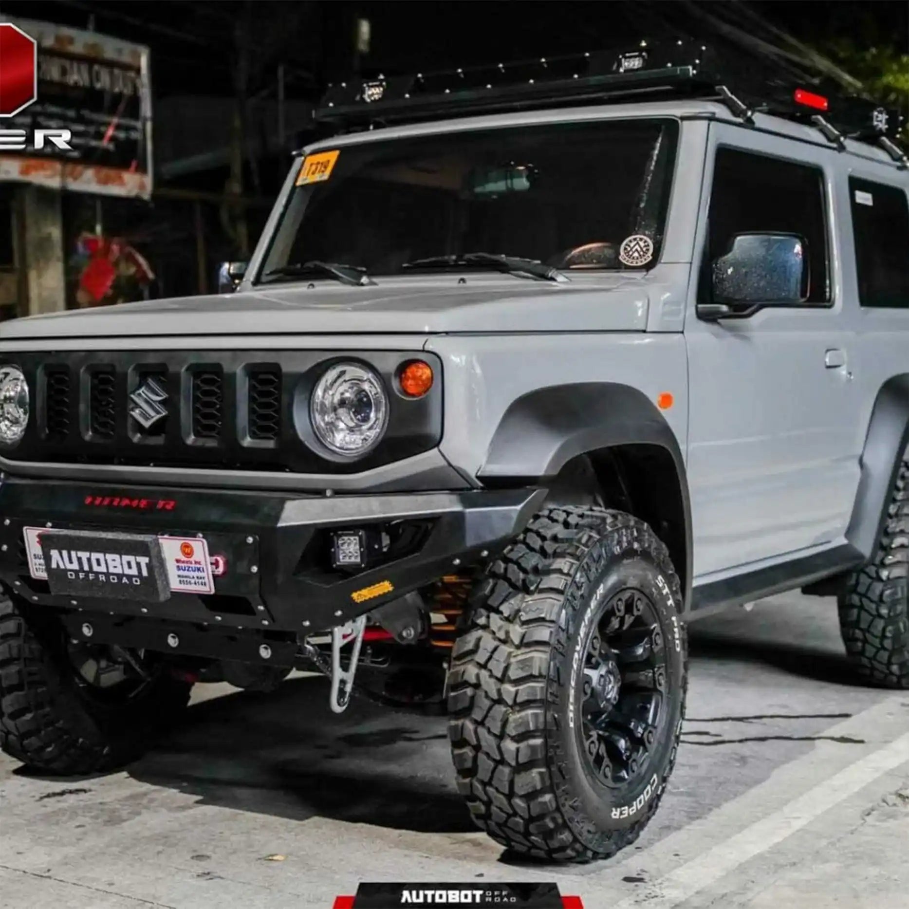 Right side of Suzuki Jimny JB74W (2018–Present) equipped with Hamer King Bull Bar, tough matte black finish and recovery points.