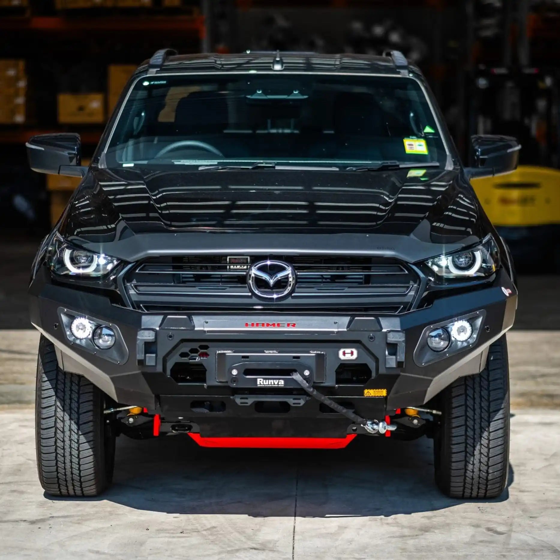 Front view of Mazda BT-50 (2021–2024) with Hamer King Series Bull Bar, matte black finish, ADR compliant and winch ready.