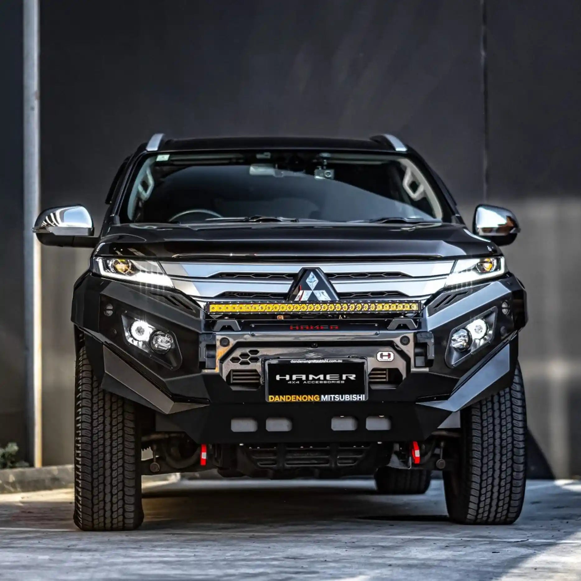 Direct front view of Mitsubishi Pajero Sport QF (2020–Present) showcasing Hamer King Series Bull Bar in matte black, engineered for safety, style, and off-road strength.