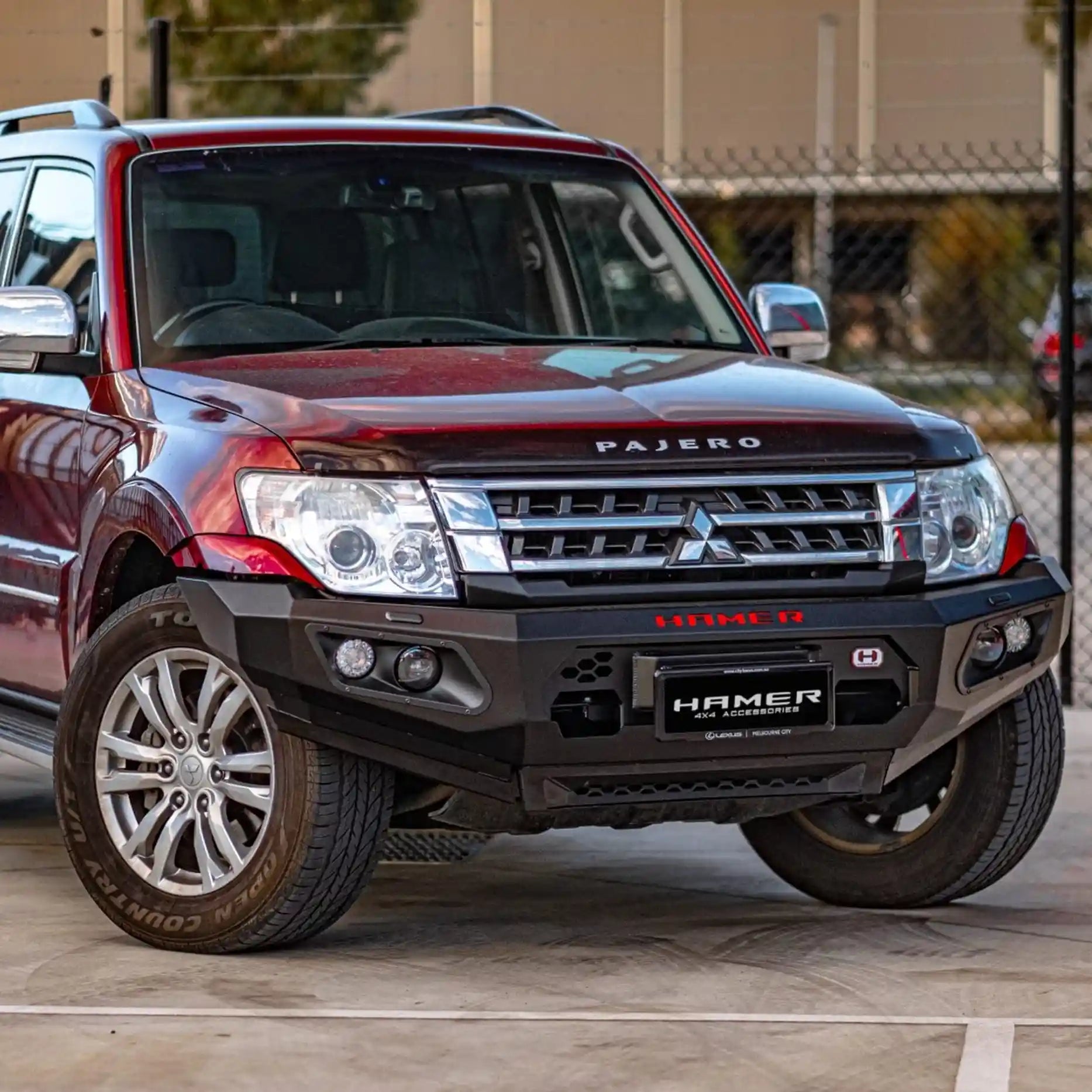 Left side profile of Mitsubishi Pajero (2006–2021) showcasing Hamer King Series Bull Bar with 3mm steel build and matte black finish.