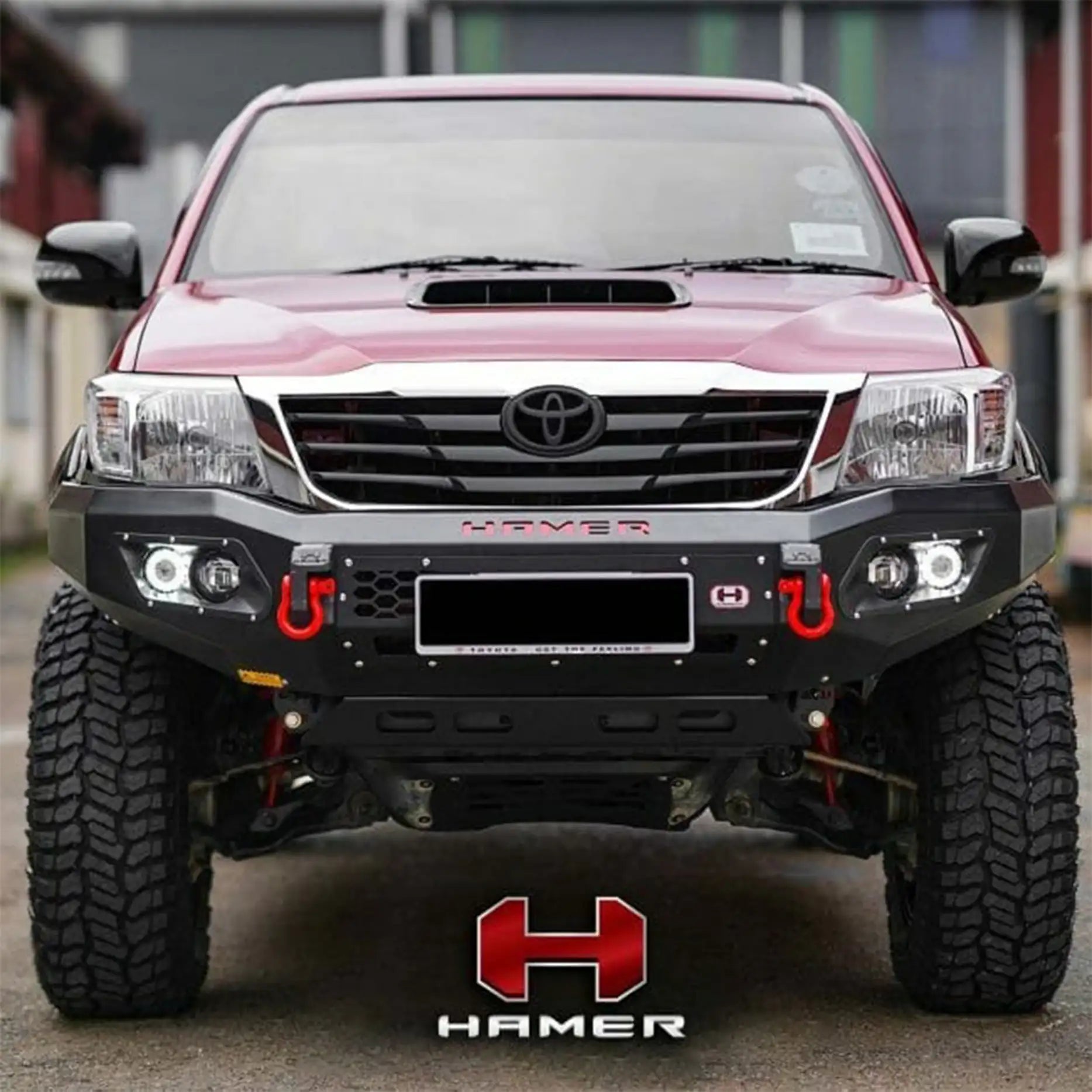 Front angle of Hilux 2011–2015 featuring Hamer King Bull Bar, heavy-duty 3mm steel, winch ready, sleek integrated design.