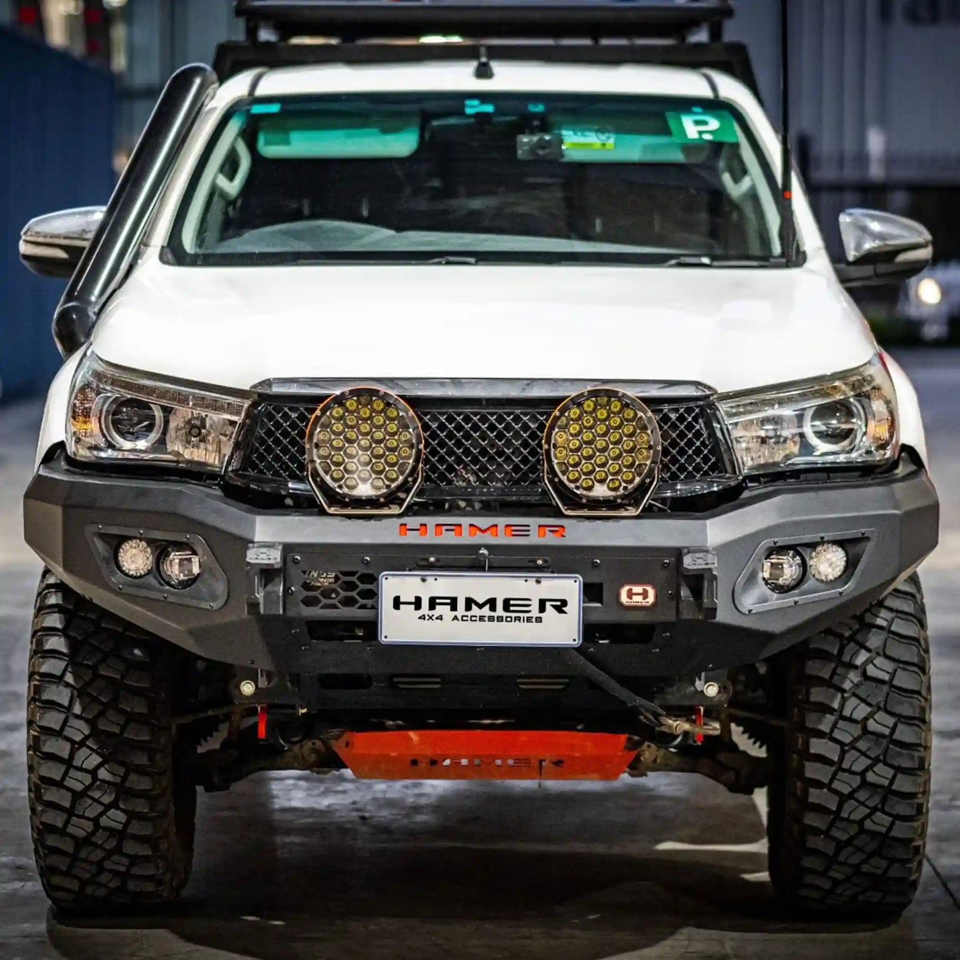 Front angle of Toyota Hilux 2015–2018 with Hamer King Bull Bar, rugged steel build, winch compatible, integrated DRL and indicators.
