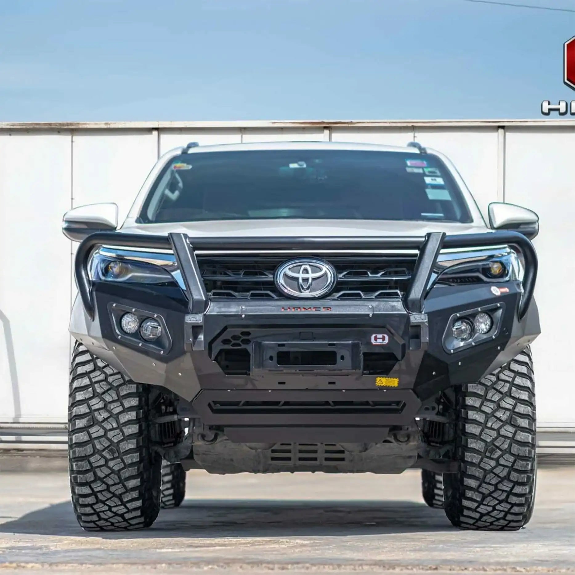 Angled front shot of Toyota Fortuner showing Hamer King Plus Bull Bar, winch compatible with integrated LED lighting system.
