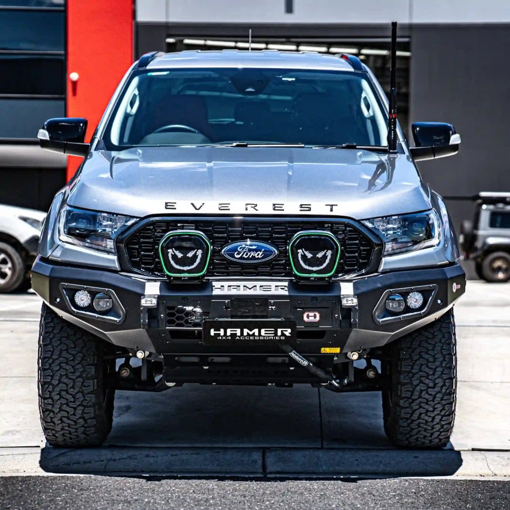 Elevate your Ford Everest (2015–2022) with the Hamer King Series Bull Bar installed at the front by Elevated 4x4 in Australia. This robust off-road accessory features ADR-compliant 3 mm high-grade steel, European-certified LED lights, and sleek matte black styling, combining ultimate protection, winch compatibility, and integration with factory sensors for confident Australian off-road adventures.