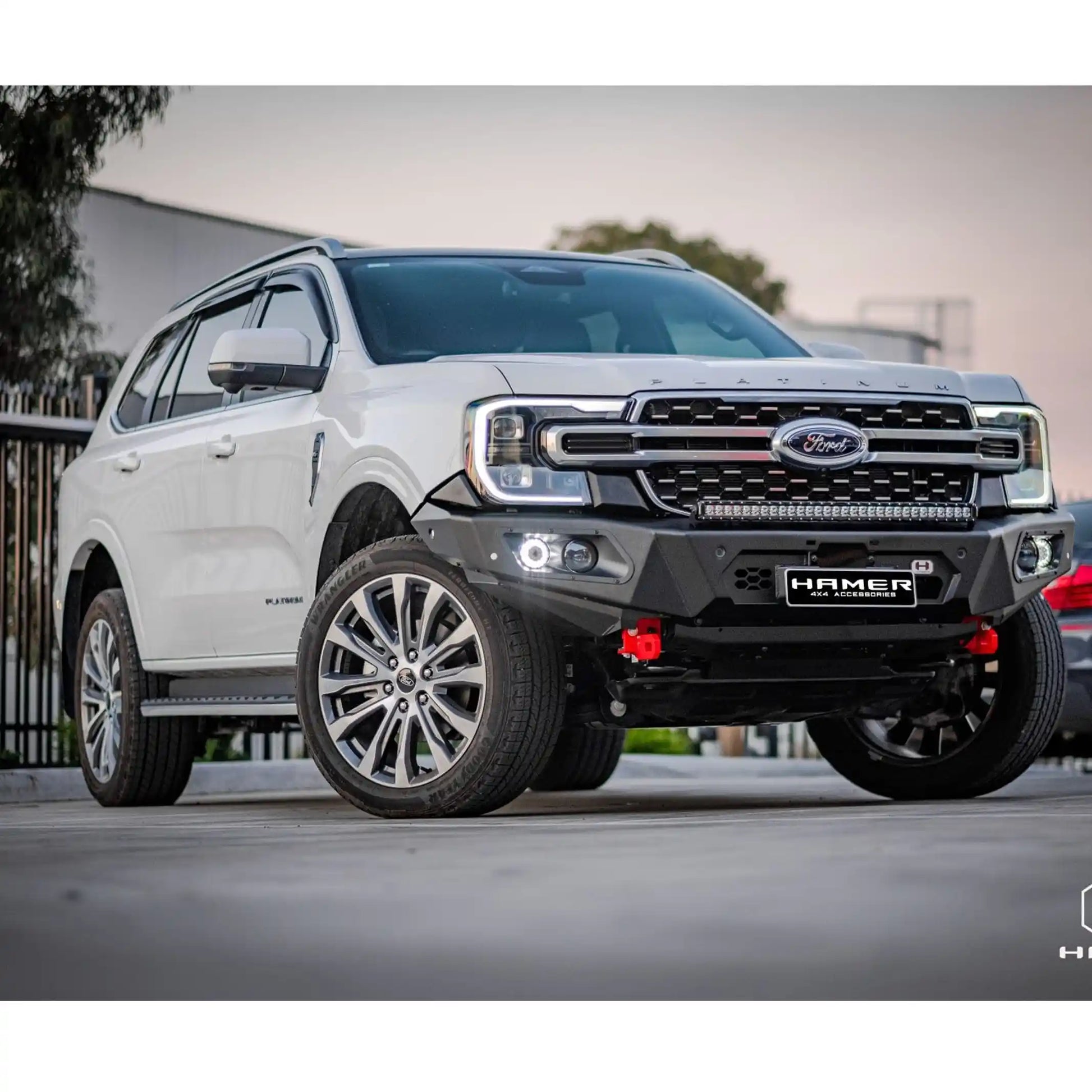 wide left view of ford everest 2022 fully equipped with hamer king series bull bar showing complete vehicle stance and off-road readiness elevated 4x4