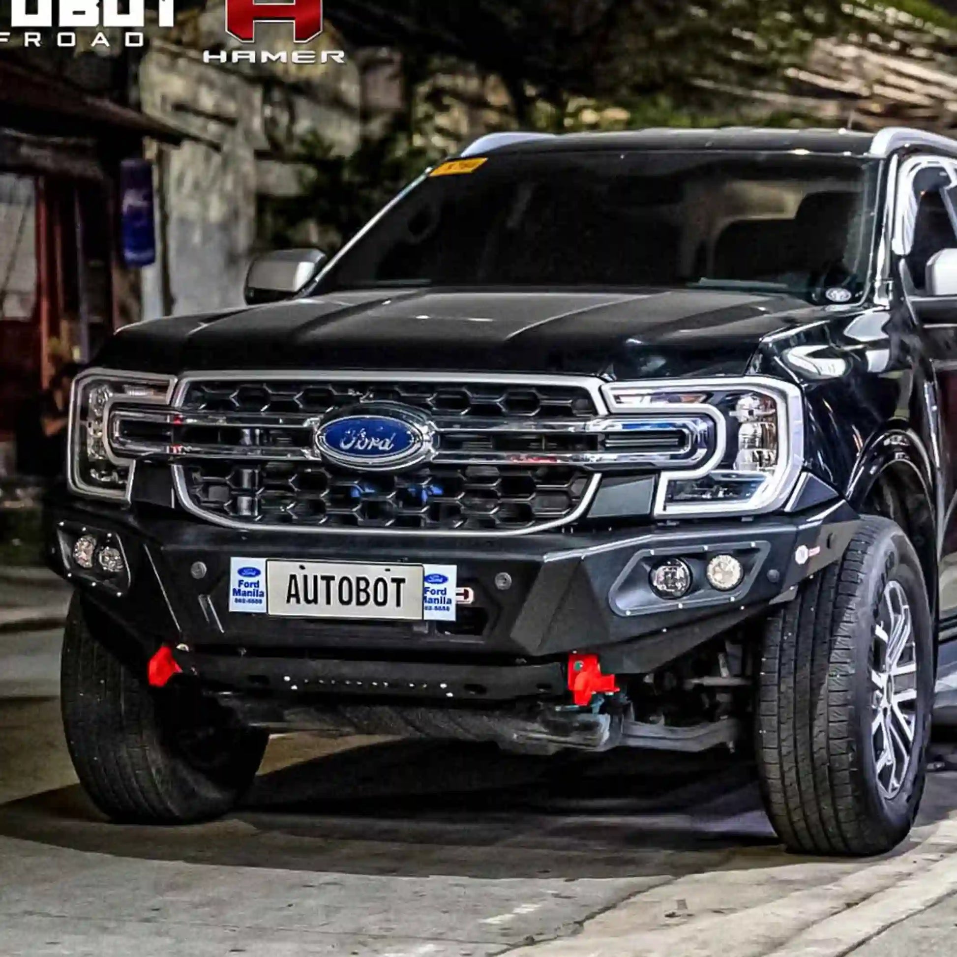 right side installed view of ford everest 2022 showing seamless integration of hamer king series bull bar with matte black powder coat and strong off-road styling elevated 4x4