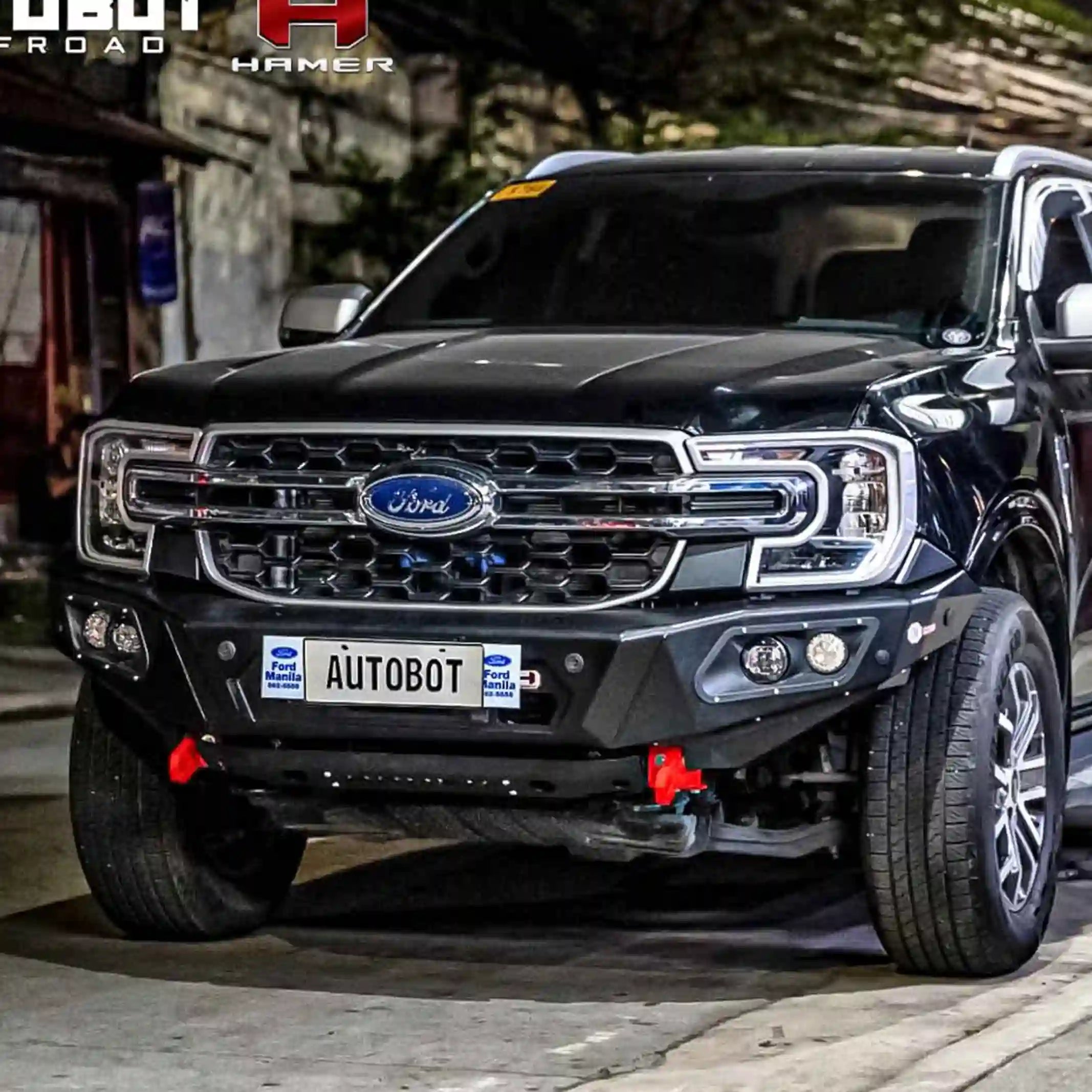 right side installed view of ford everest 2022 showing seamless integration of hamer king series bull bar with matte black powder coat and strong off-road styling elevated 4x4