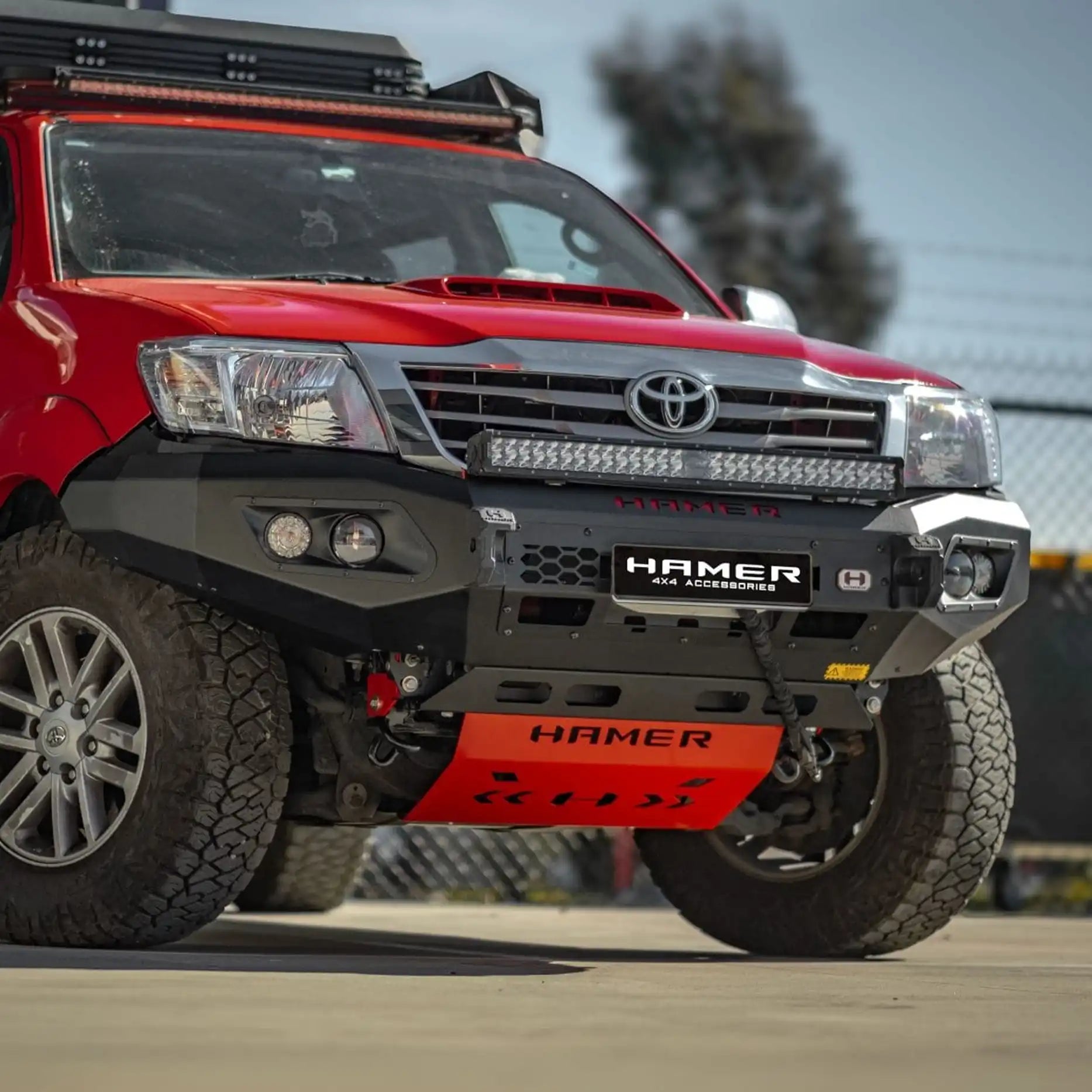 Left side of Toyota Hilux 2011–2015 showcasing Hamer King Bull Bar, rugged steel build, stylish design with light bar slot.
