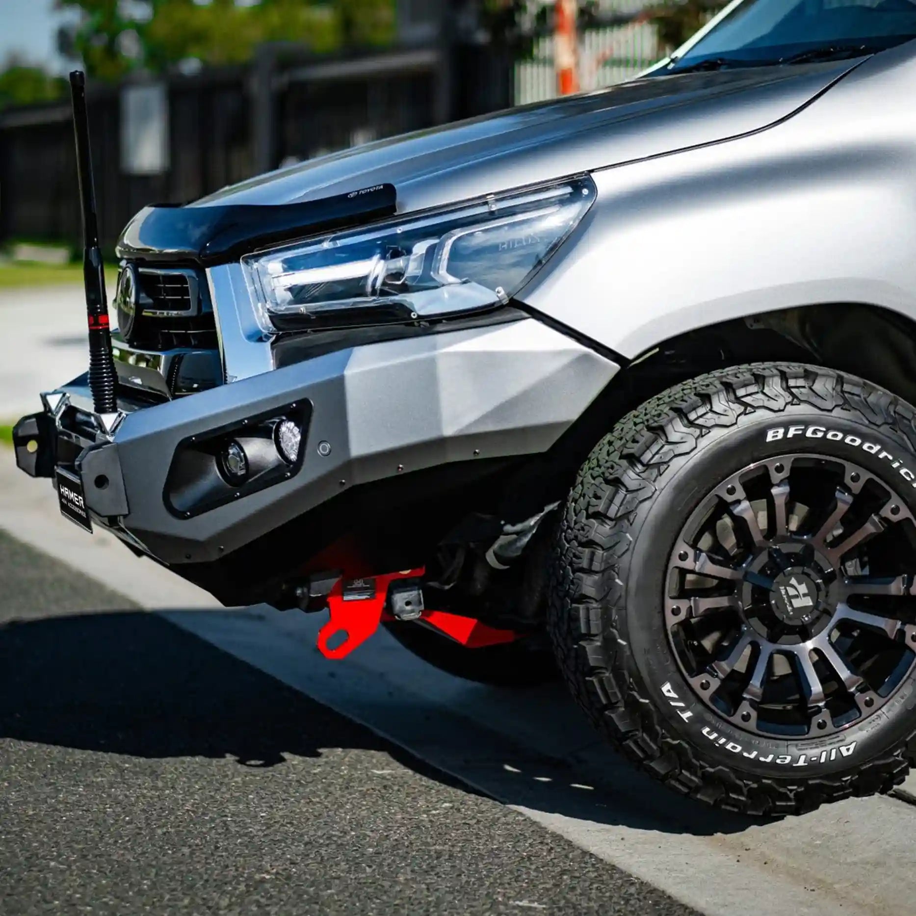 Right side angle of Toyota Hilux (2020–2023) fitted with Hamer King Bull Bar, stylish matte black finish with strength and safety.
