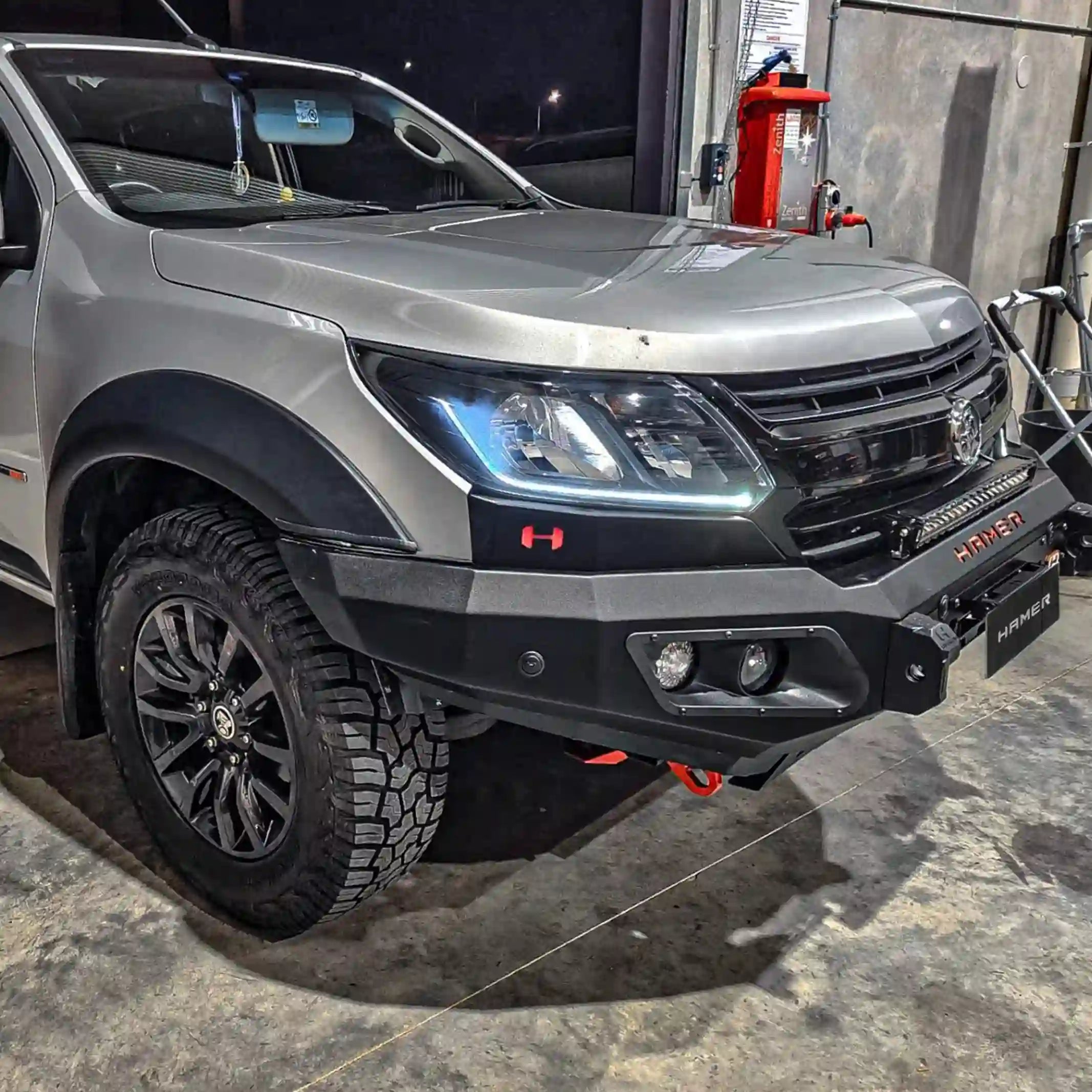 left installed view of hamer king bull bar on holden colorado with led lights winch mount and tough steel design elevated 4x4