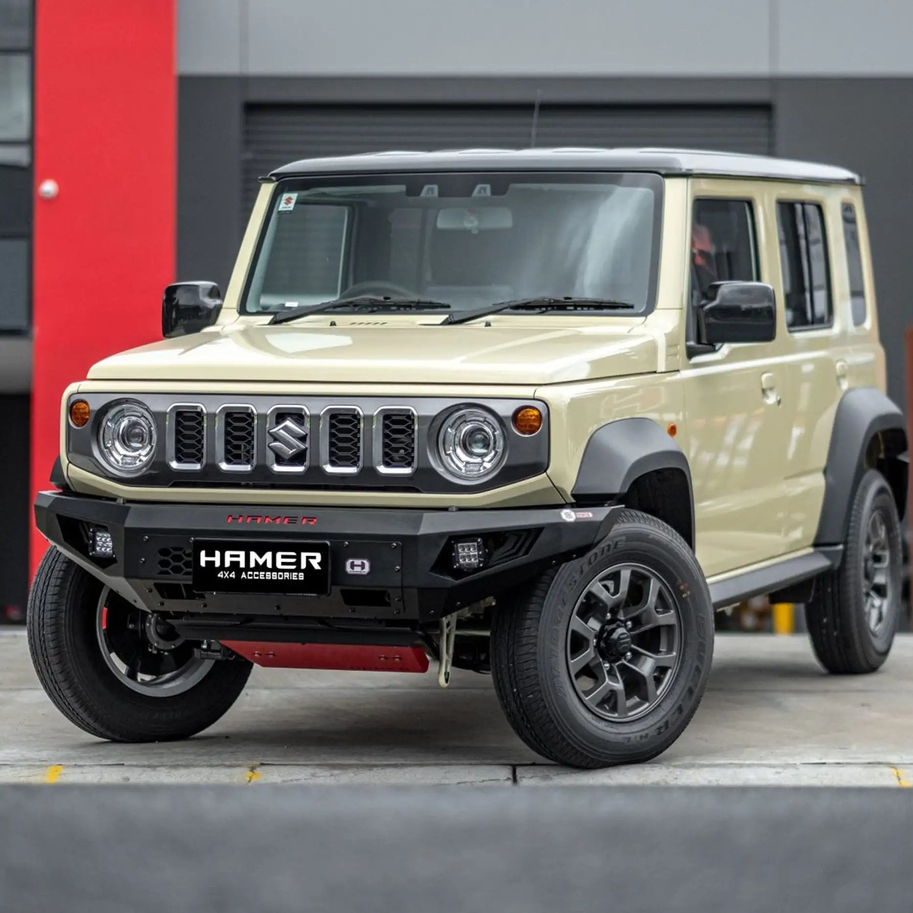 Right side of Jimny XL 2023 showing Hamer King Series Bull Bar, durable steel, ADR compliant with work lights and indicators.