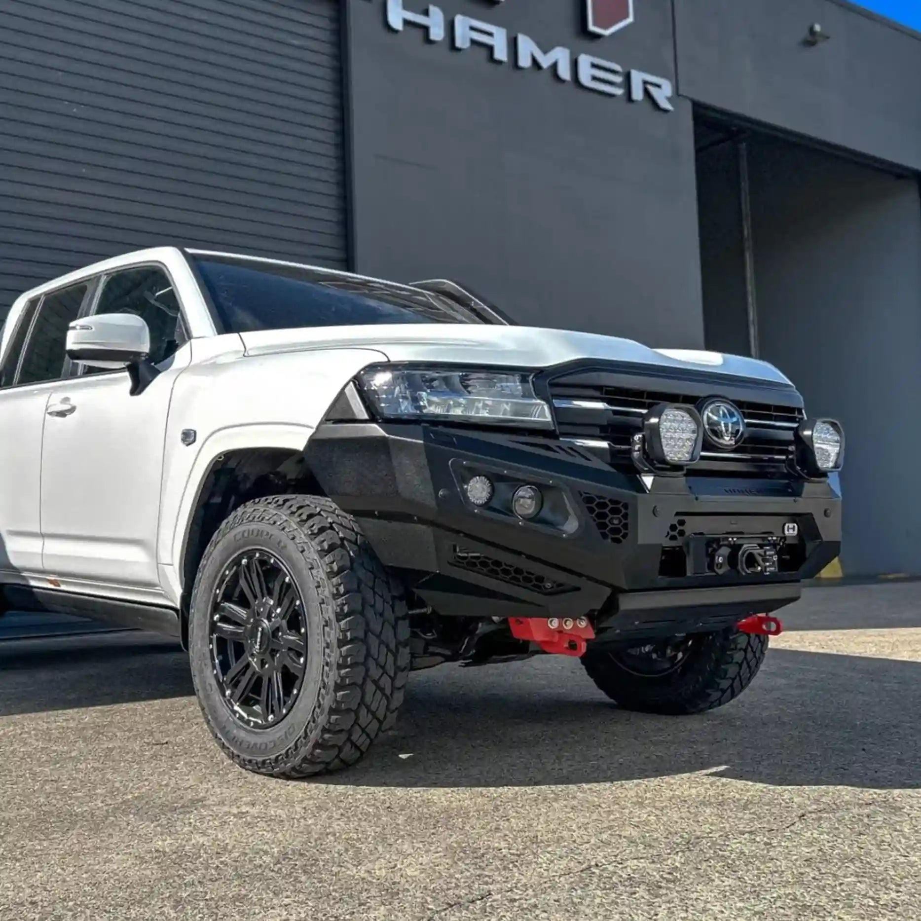 Left side of Landcruiser 300 fitted with Hamer King Series Bull Bar, sleek matte black finish, factory sensor compatible, tough and stylish.