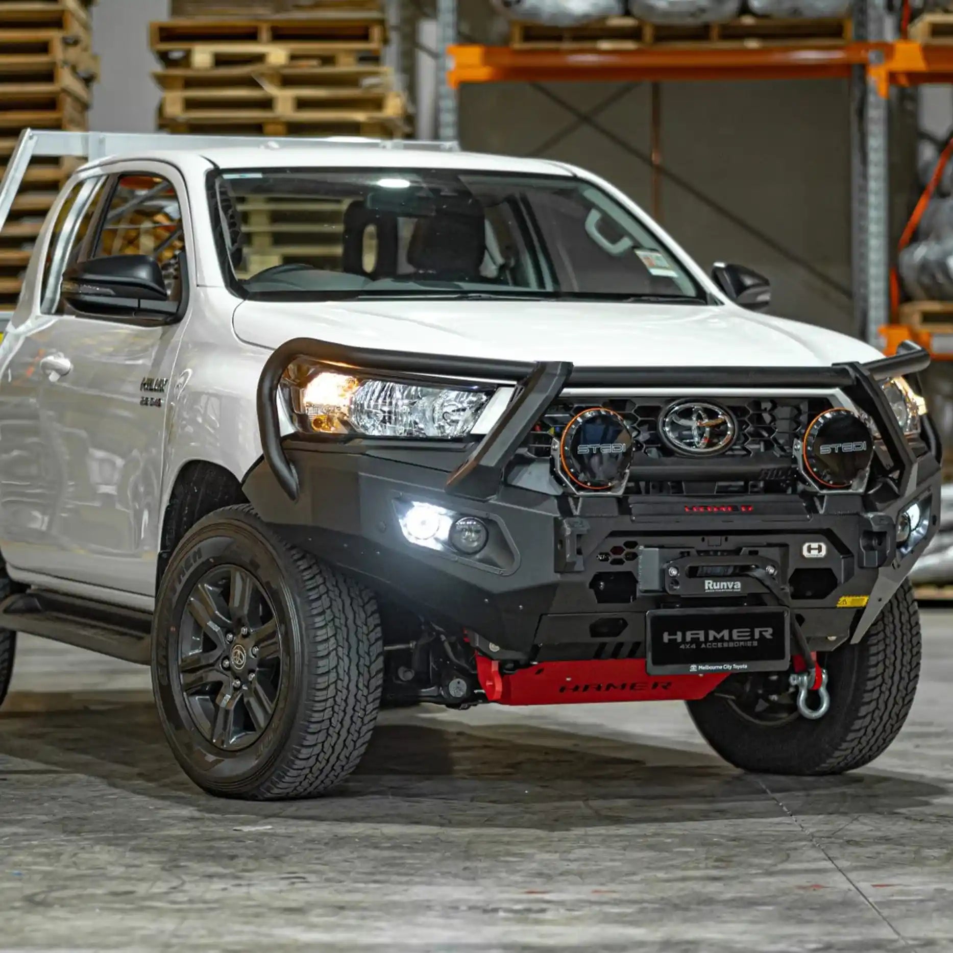 Left side Toyota Hilux 2024 with Hamer King Series Plus Bull Bar, featuring E-Mark LED lights, recovery points, and sleek integrated design.