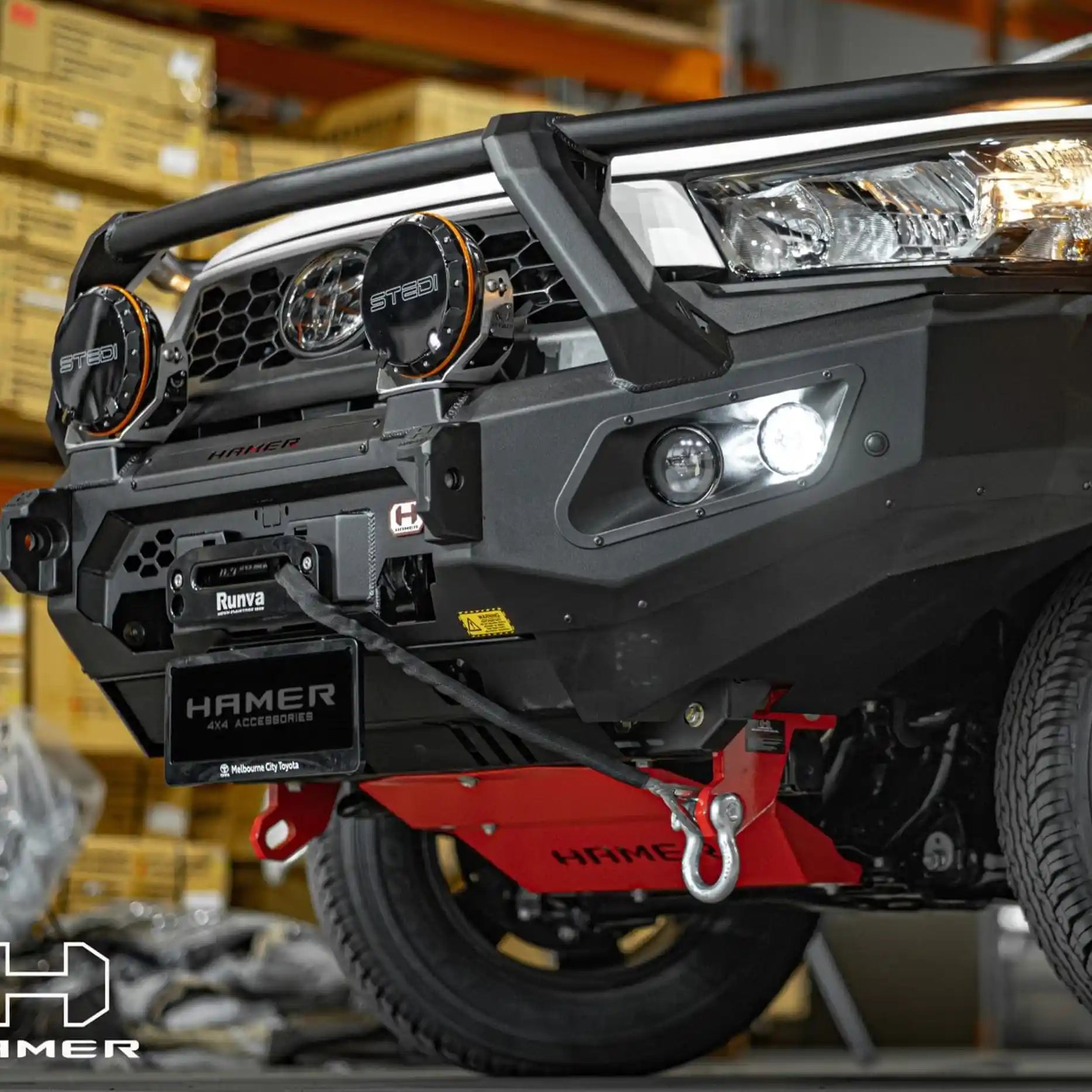 Right side view of Hilux 2024 with Hamer King Series Plus Bull Bar, rugged triple loop style, sensor compatible, built for strength and safety.
