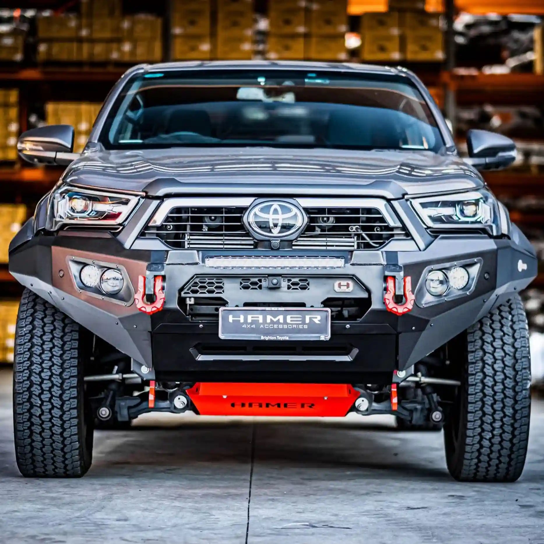 Front angle of Toyota Hilux Rogue (2022–Present) fitted with Hamer King Series Bull Bar, winch ready with integrated LED lights.