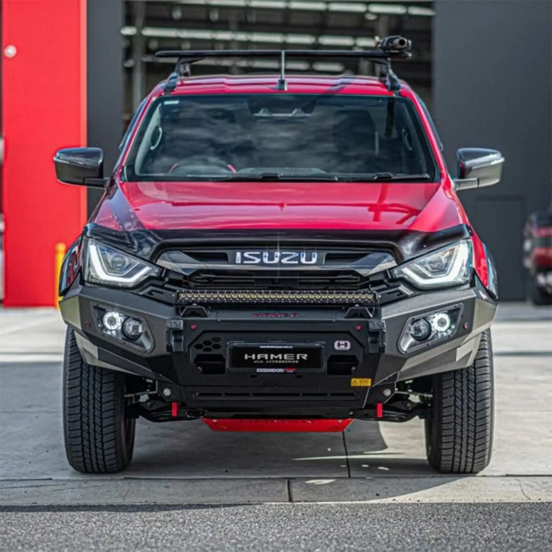 Front-on angle of Hamer 4x4 King Series Bull Bar for Isuzu D-Max 2021–2024, with LED lighting, winch access, and recovery points.