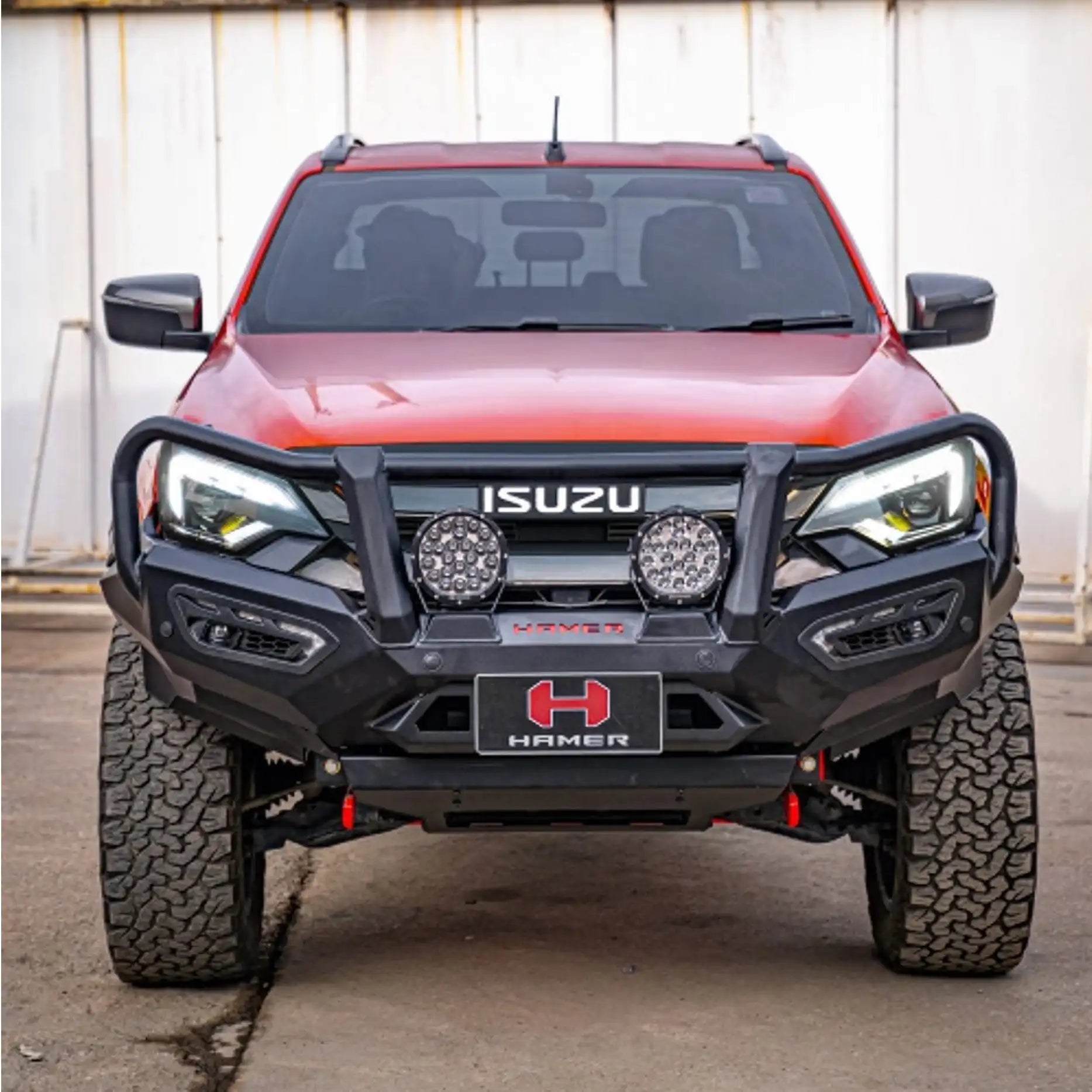 Front view of Hamer Atlas Plus Series Bull Bar on Isuzu D-Max 2024 – Present, showing full bumper replacement design, ADR / Airbag compliance, E-Mark LED lighting, and sleek matte black finish.