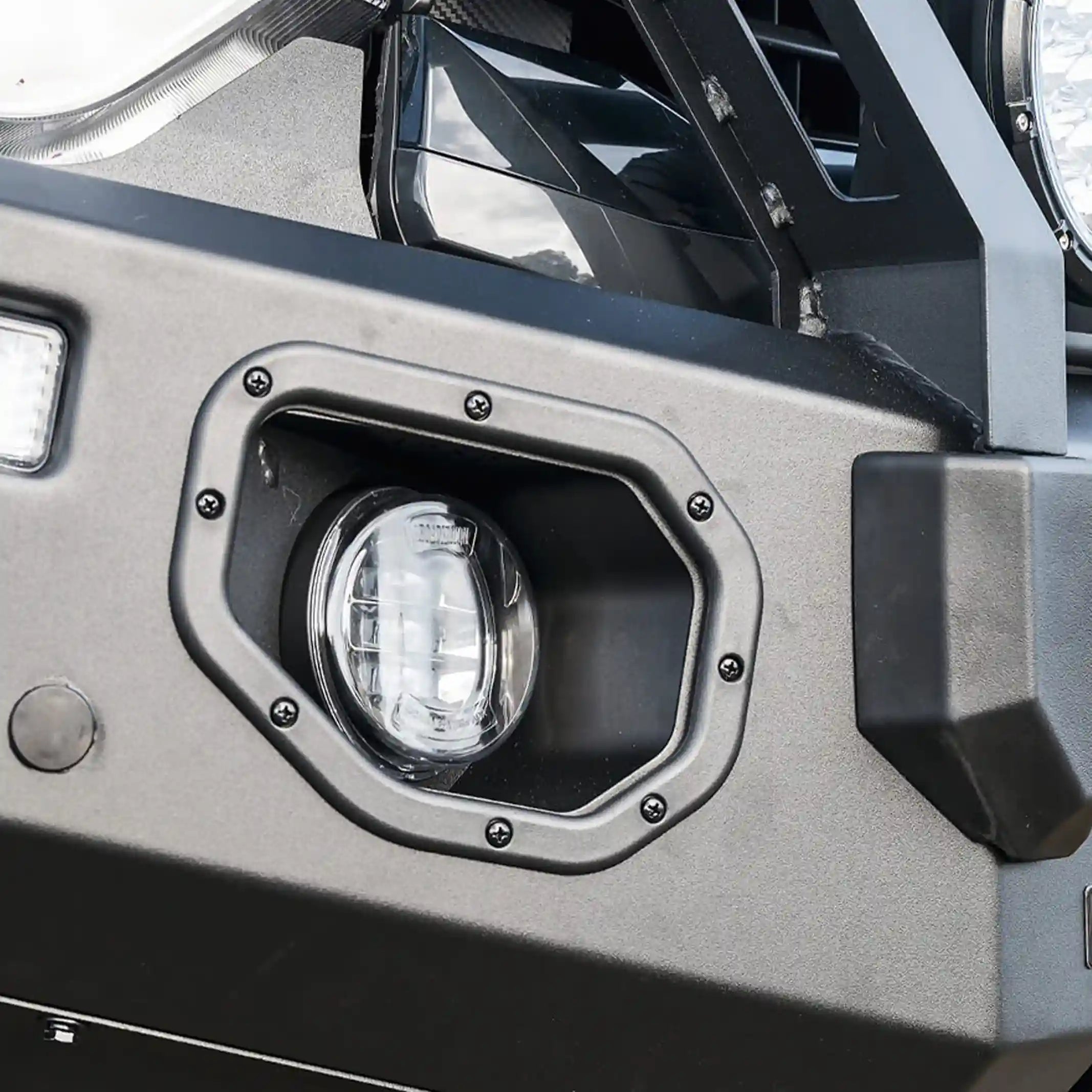 close detail view oxley bull bar installed on isuzu dmax showing recovery points and sensor compatibility elevated 4x4